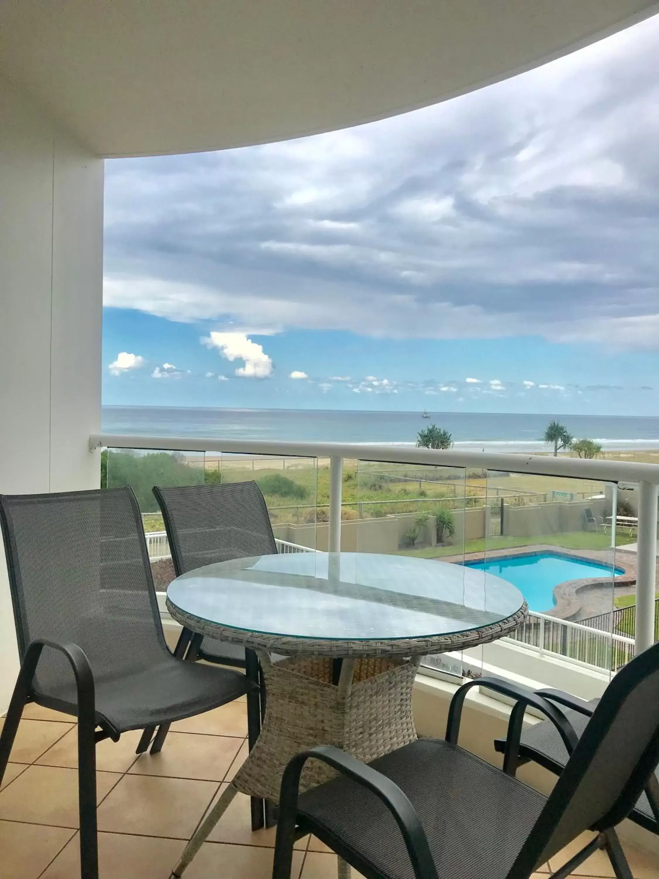 Balcony/Terrace, Pool View in Regency on the Beach