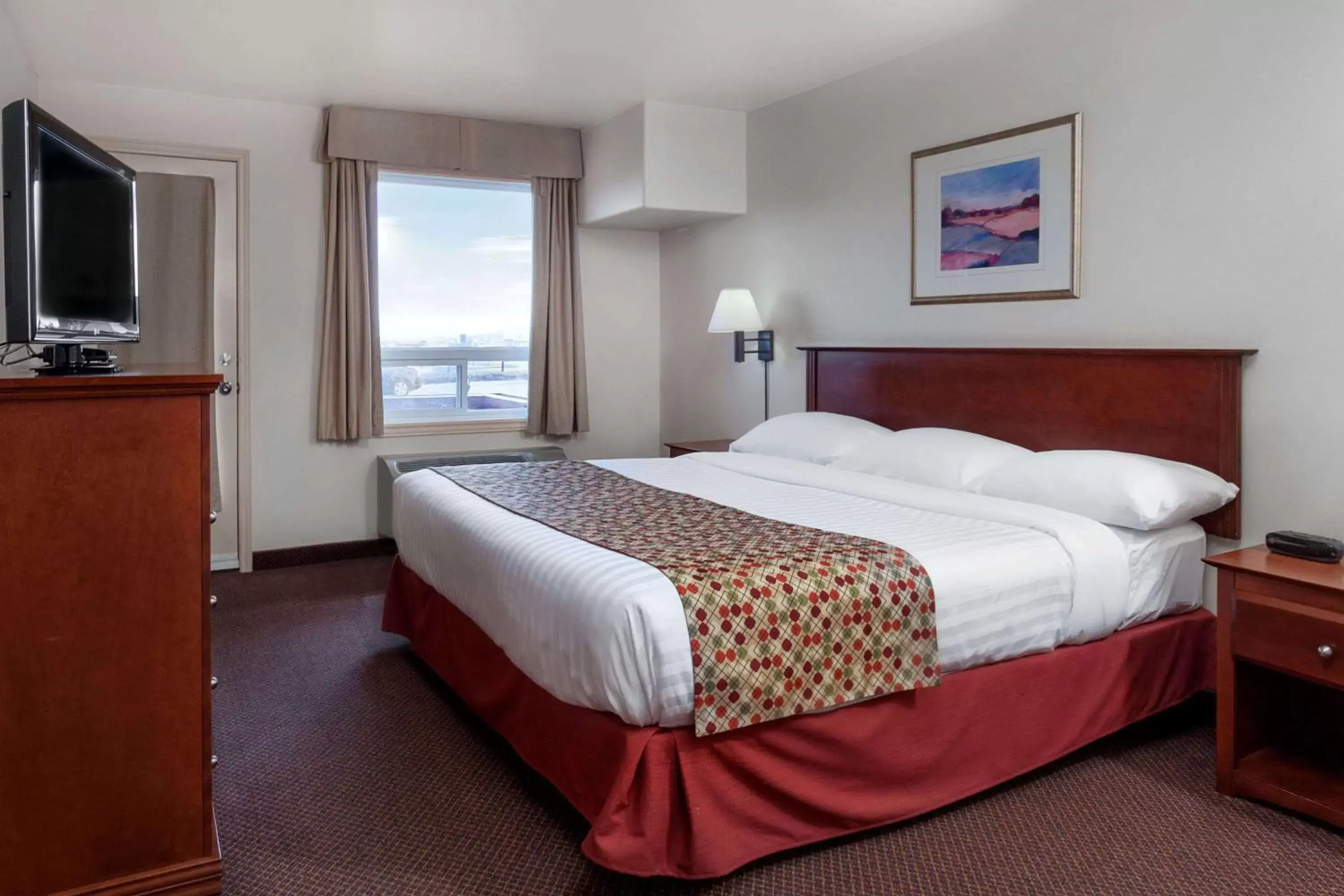Photo of the whole room, Bed in Super 8 by Wyndham Caraquet Photo of the whole room, Bed in Super 8 by Wyndham Caraquet