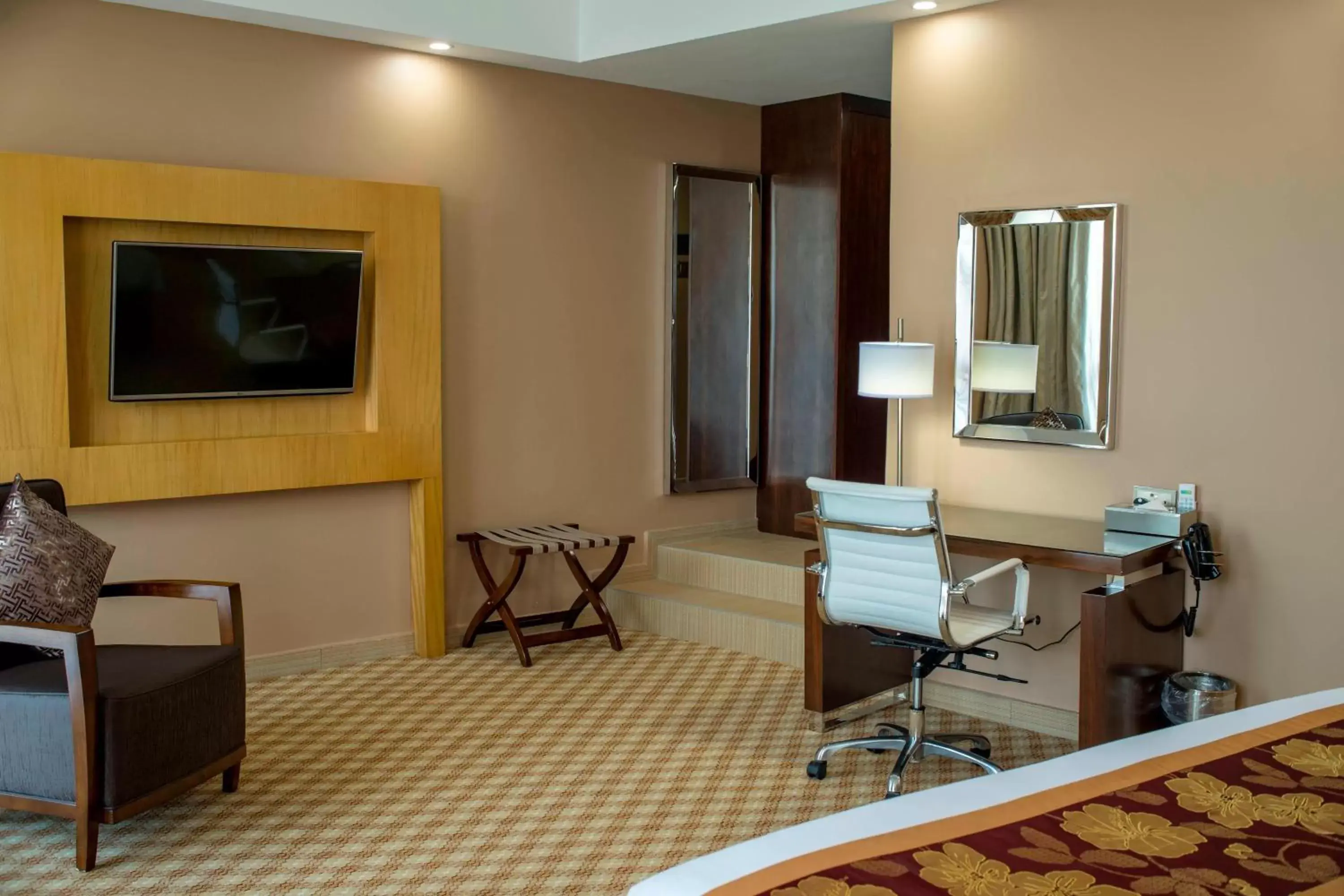 Photo of the whole room, TV/Entertainment Center in Protea Hotel by Marriott Entebbe