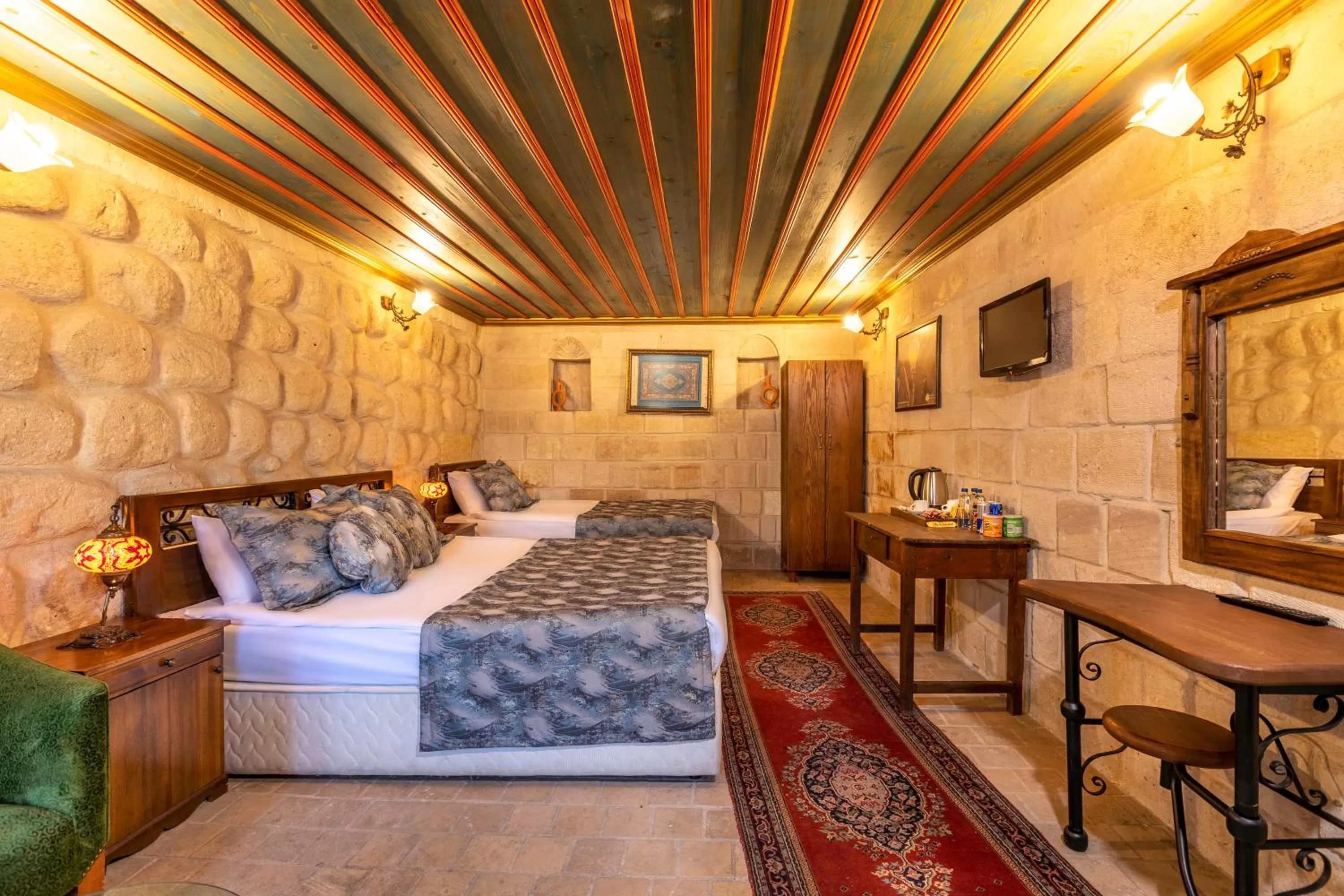 Bed in Adora Cave Suites -