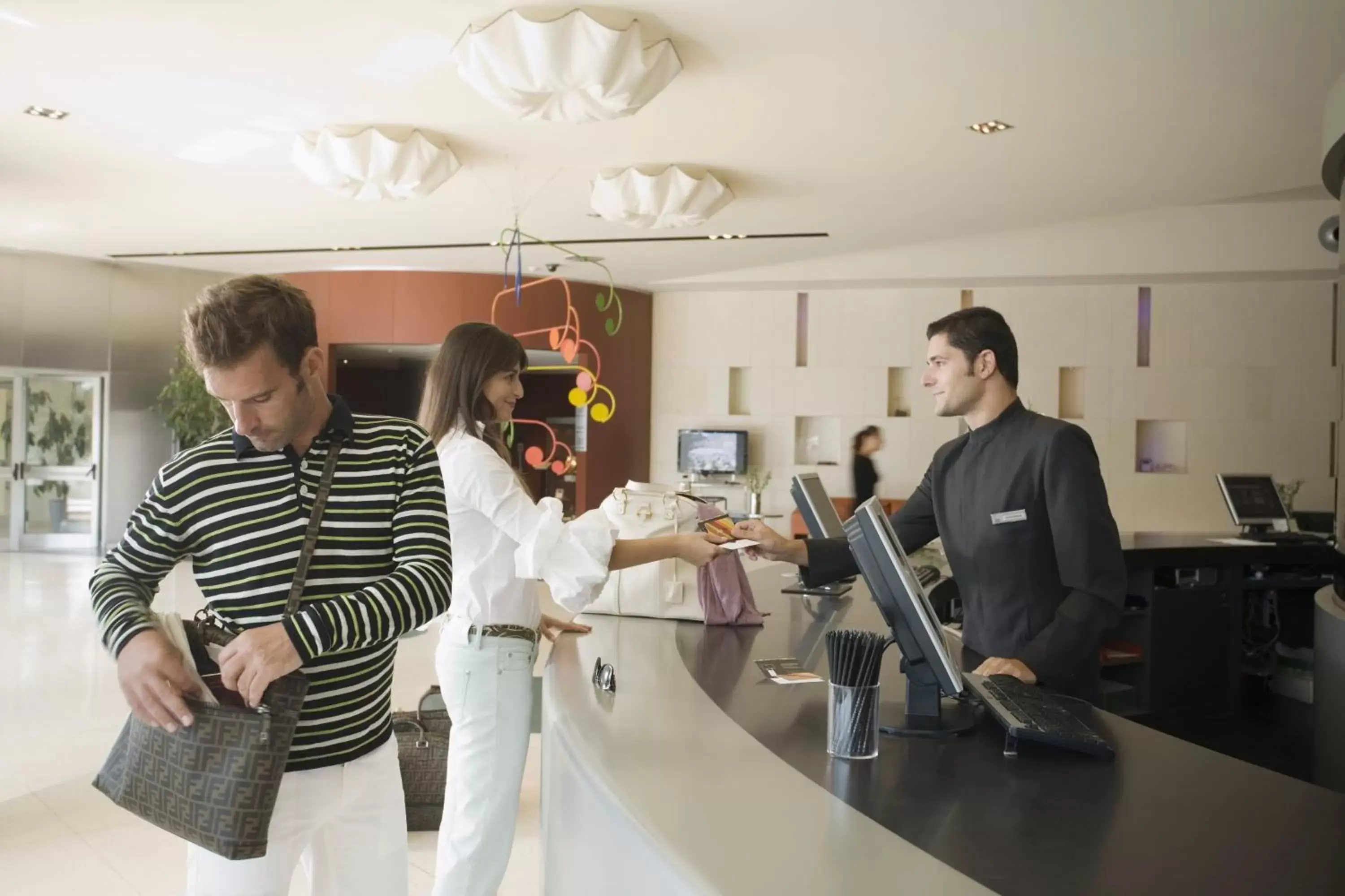 Staff in UNAHOTELS T Hotel Cagliari