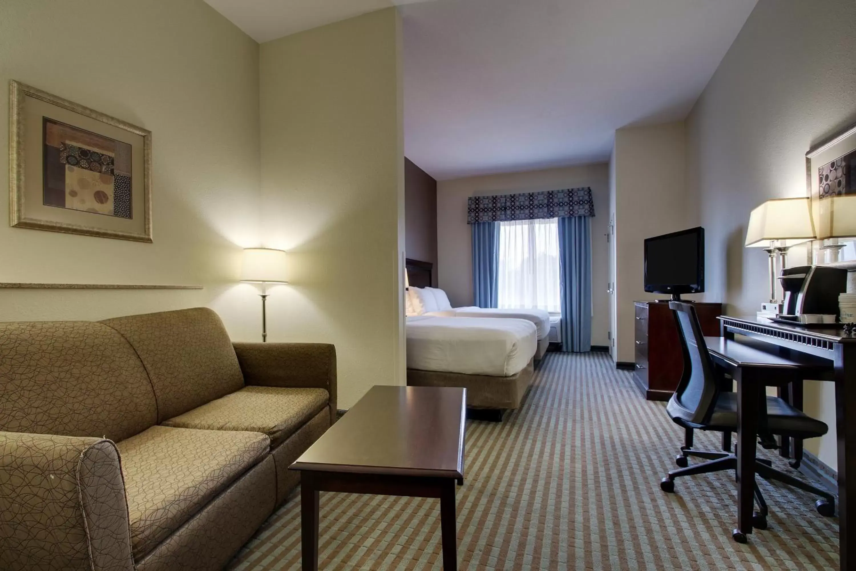 Photo of the whole room, Seating Area in Holiday Inn Express Leland - Wilmington Area, an IHG Hotel