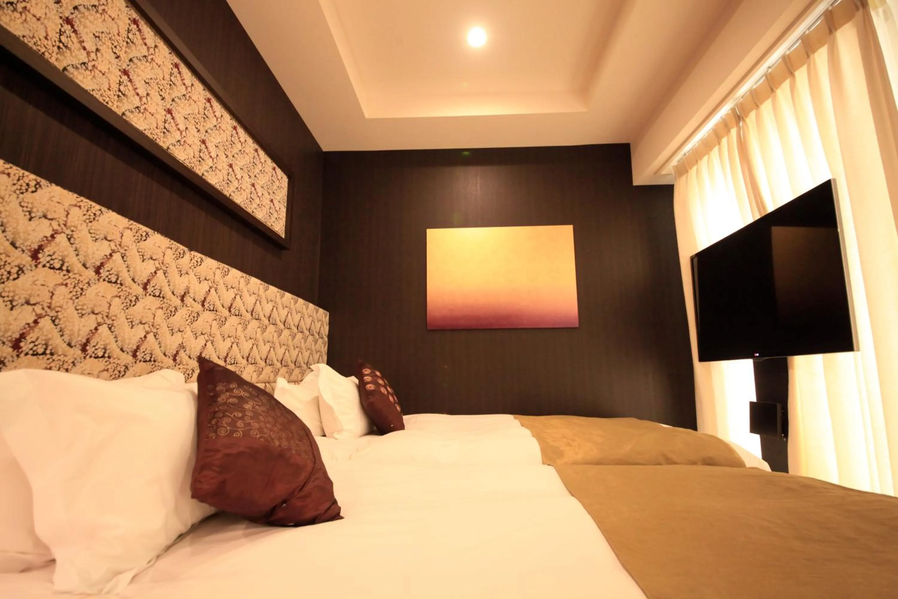 Photo of the whole room, Bed in Centurion Hotel Grand Akasakamitsuke Station