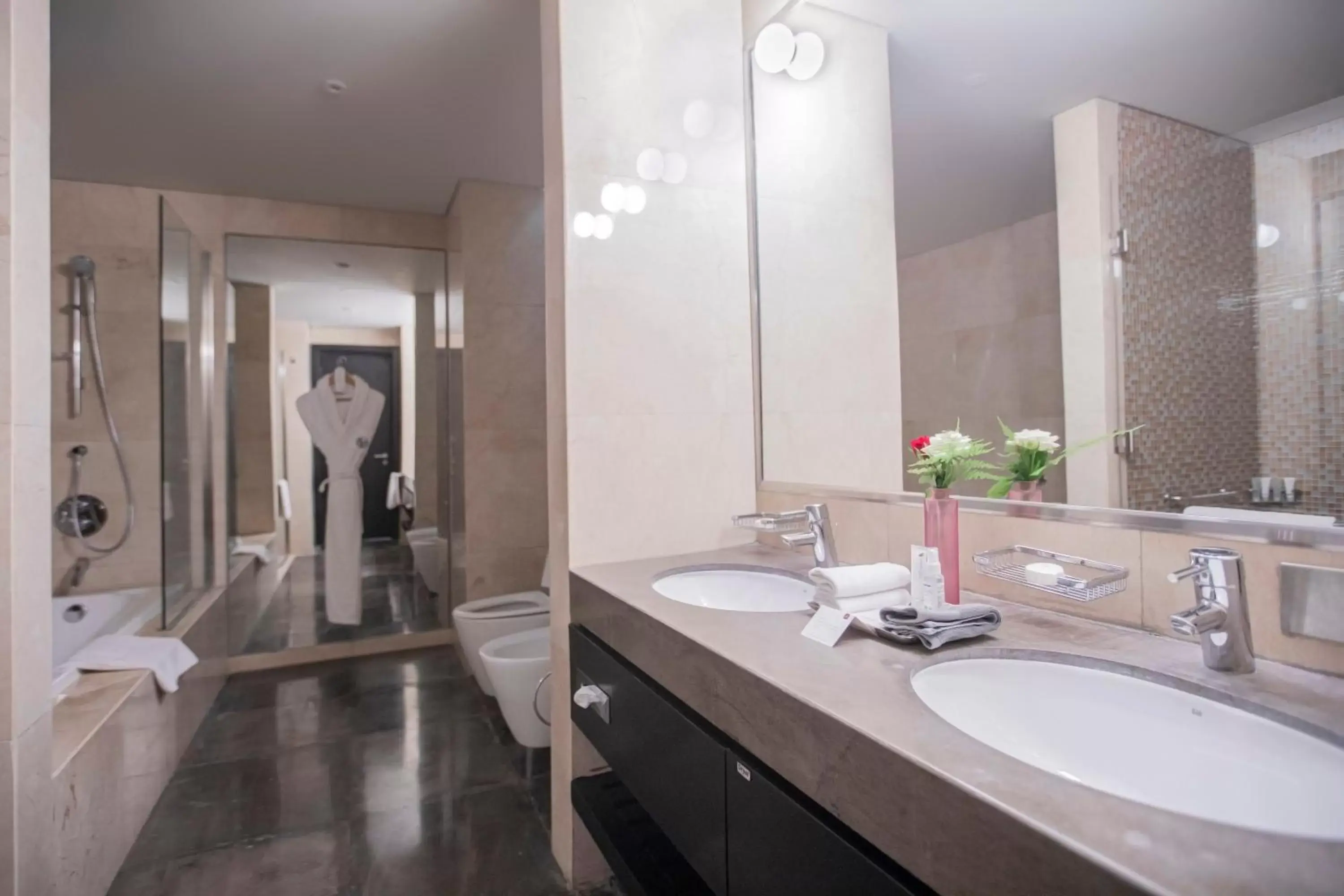 Bathroom in The Boulevard Arjaan by Rotana