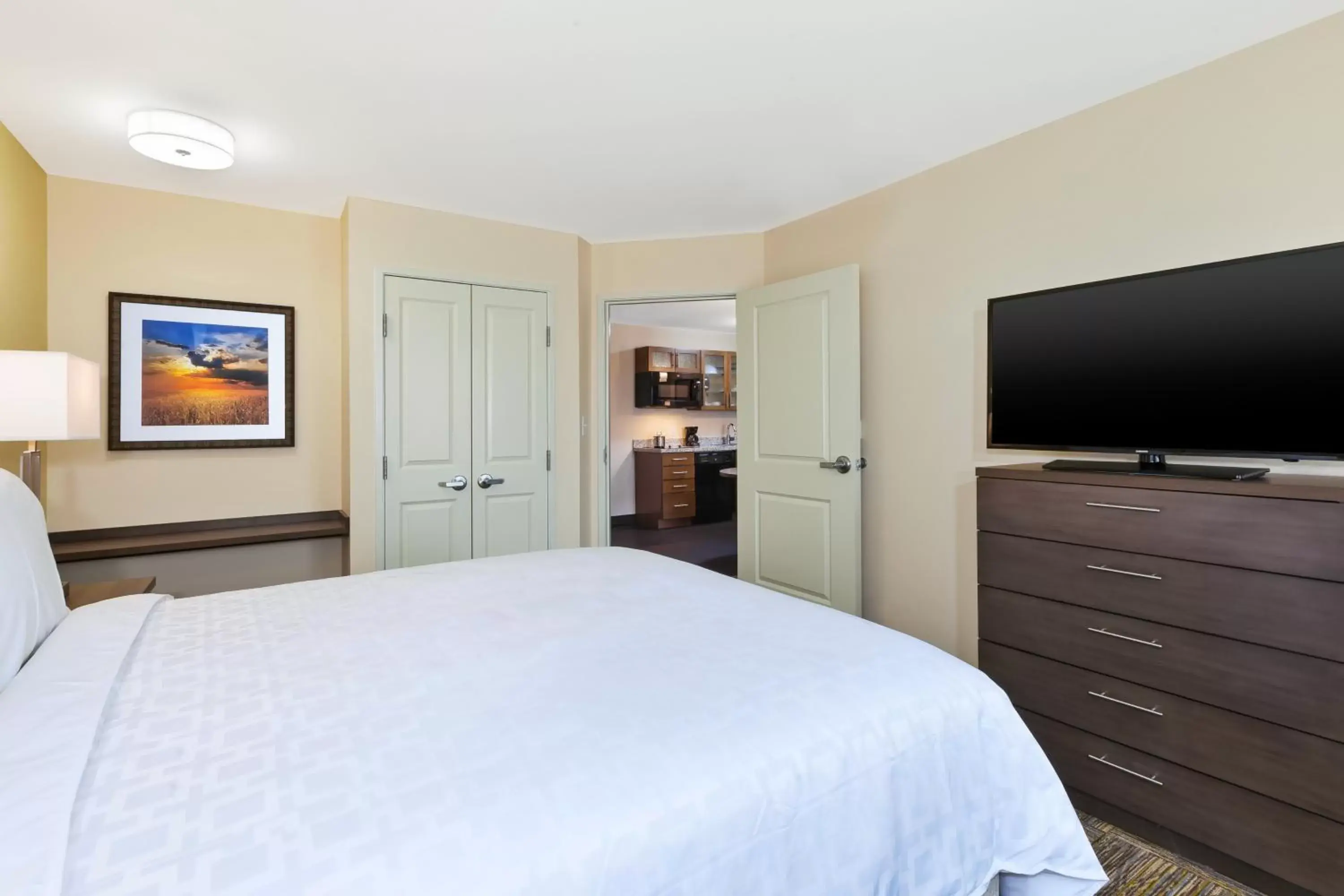 Bed in Candlewood Suites Louisville - NE Downtown Area, an IHG Hotel