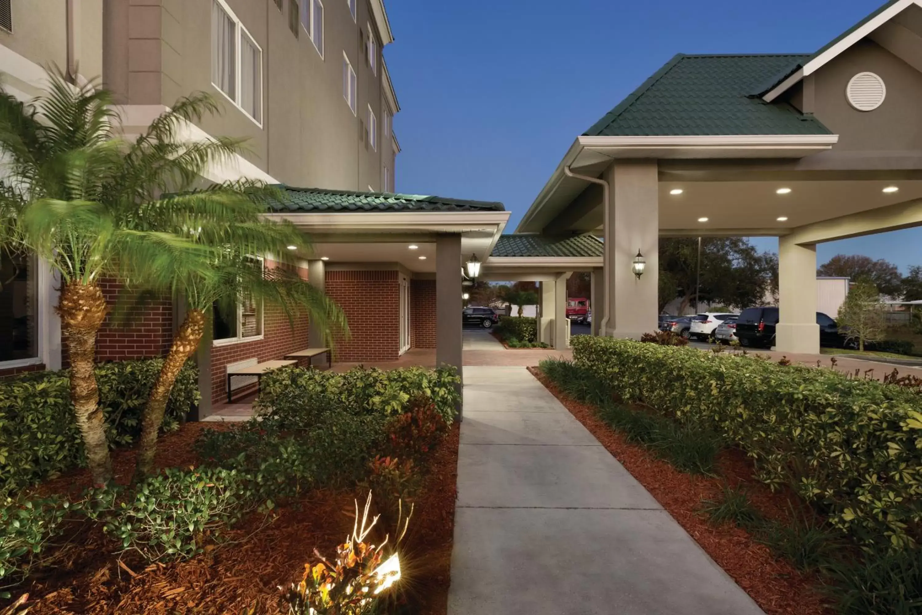 Patio, Property Building in Country Inn & Suites by Radisson, St. Petersburg - Clearwater, FL