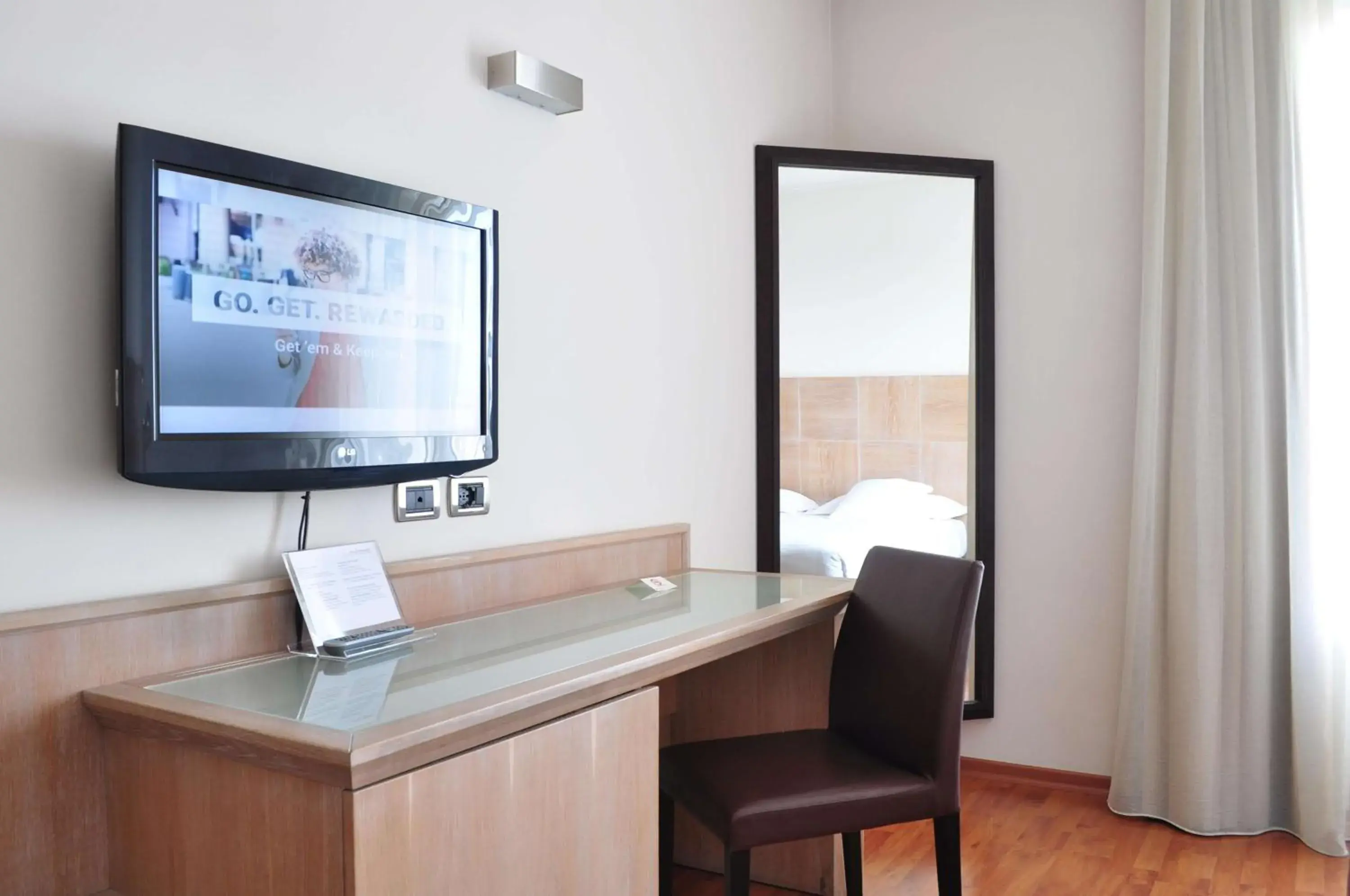 Living room, TV/Entertainment Center in San Giorgio, Sure Hotel Collection by Best Western