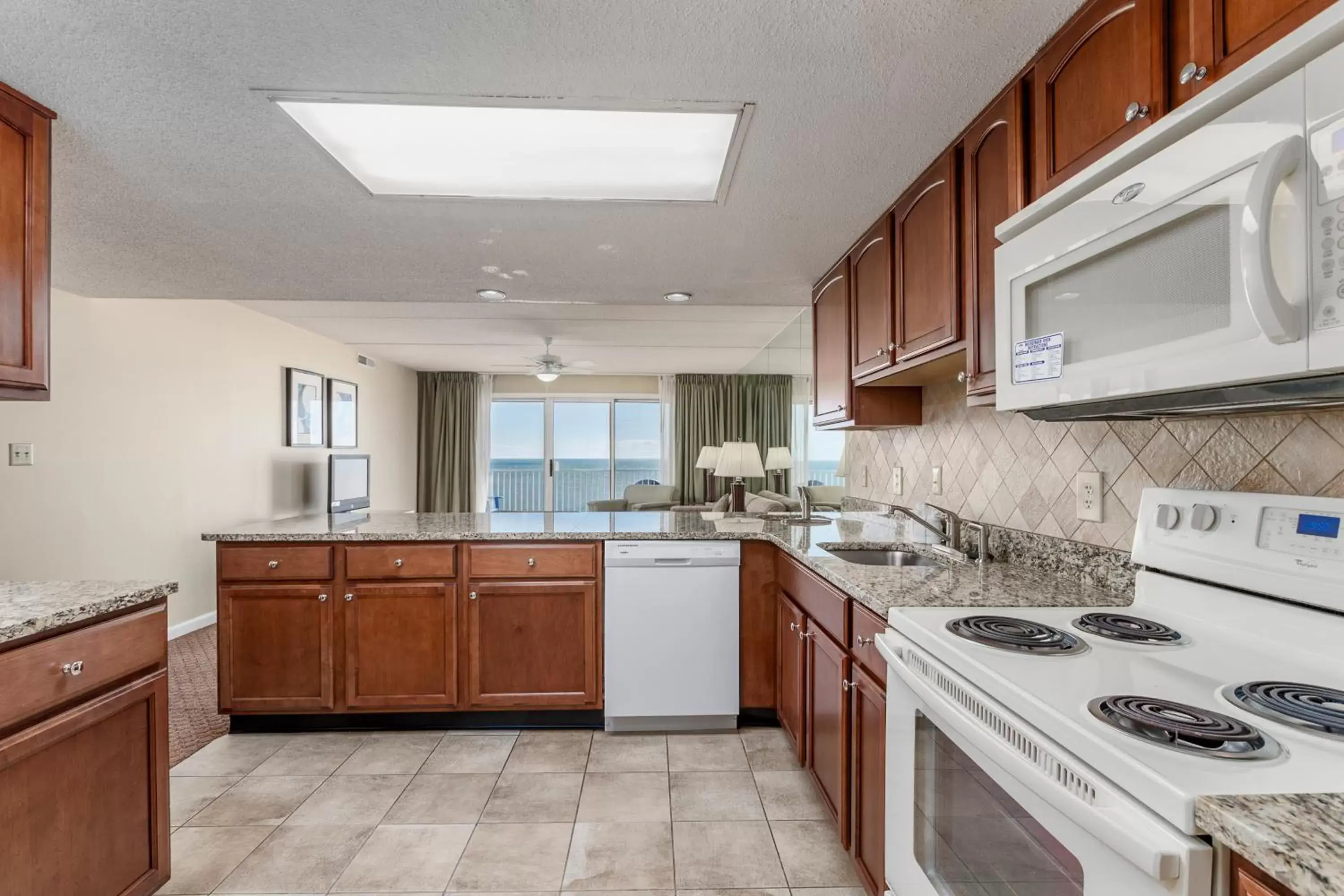 Balcony/Terrace, Kitchen/Kitchenette in Princess Royale Oceanfront Resort