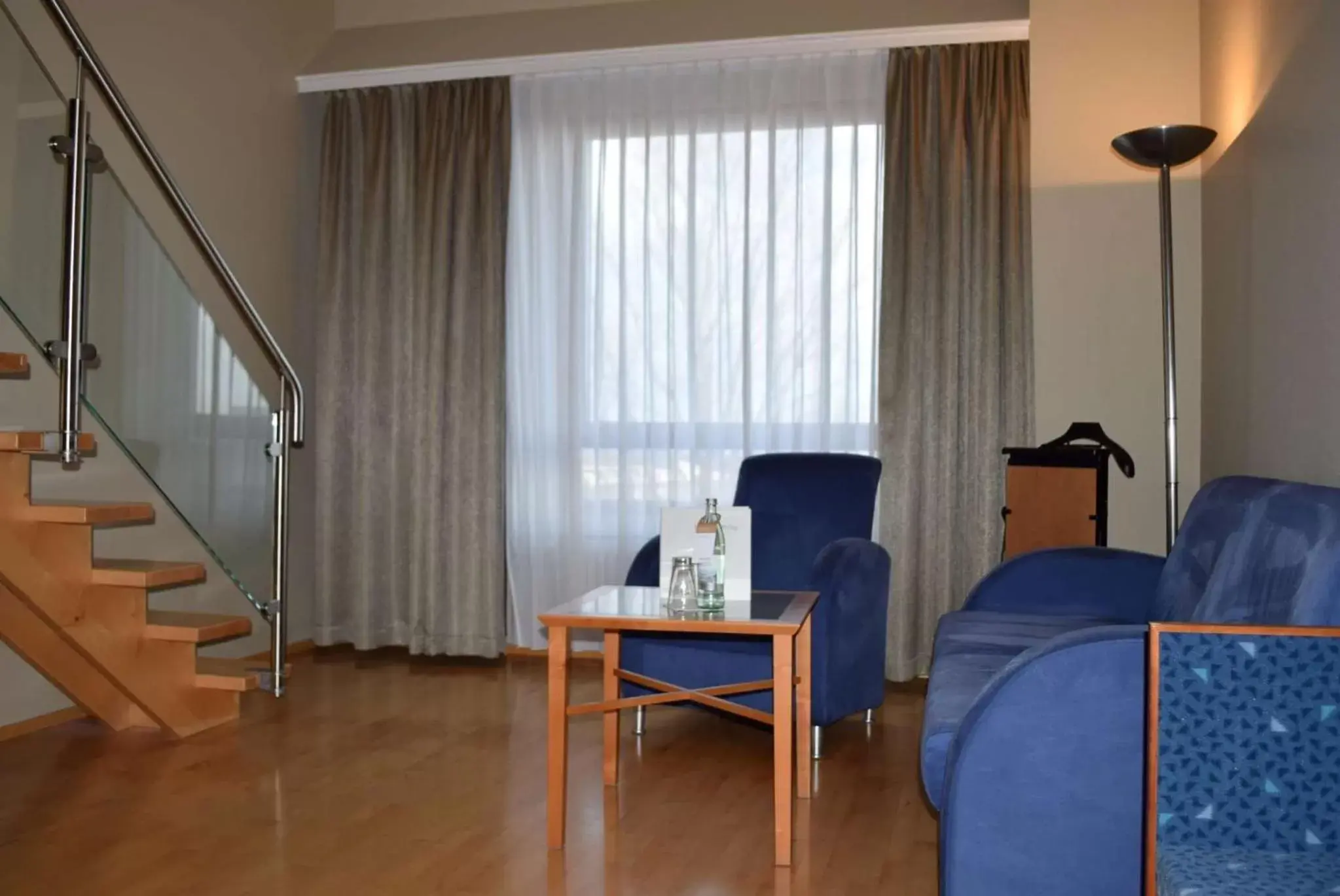 Photo of the whole room, Seating Area in elaya hotel frankfurt oberursel, ehemals The Rilano Hotel Oberursel
