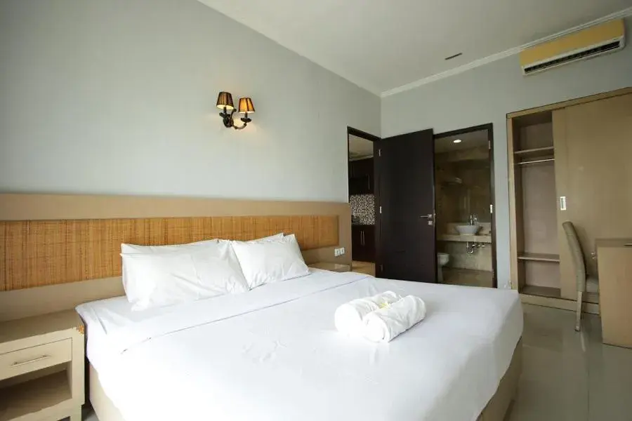 Bed in Serela Kuta by KAGUM Hotels