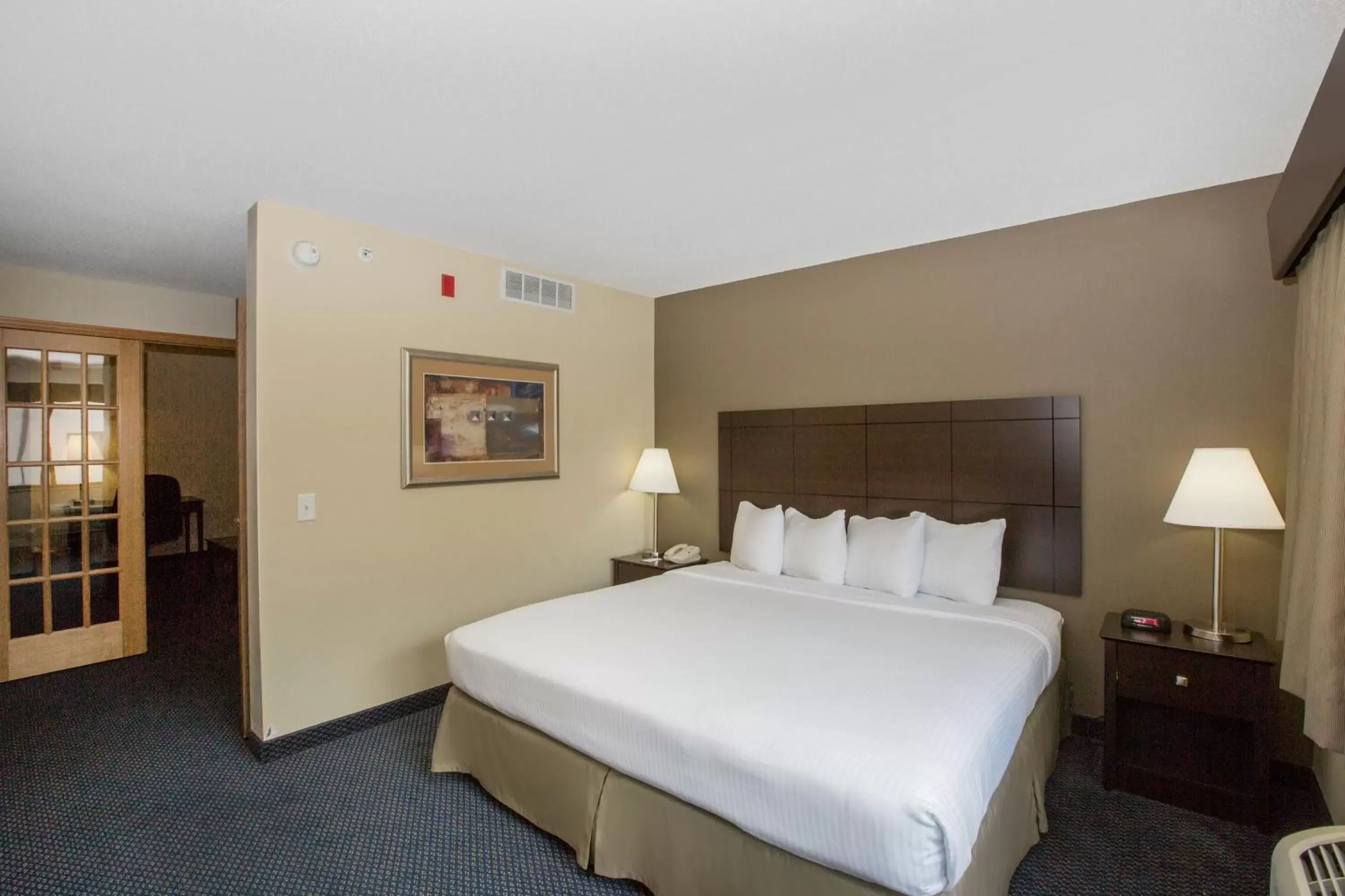Bedroom, Bed in AmericInn by Wyndham Lincoln South
