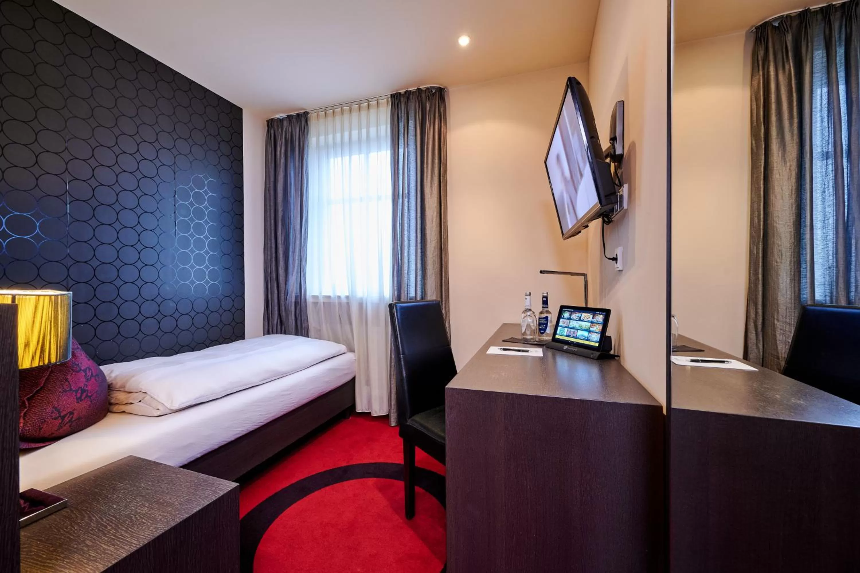 Photo of the whole room, Bed in Genusshotel Wenisch