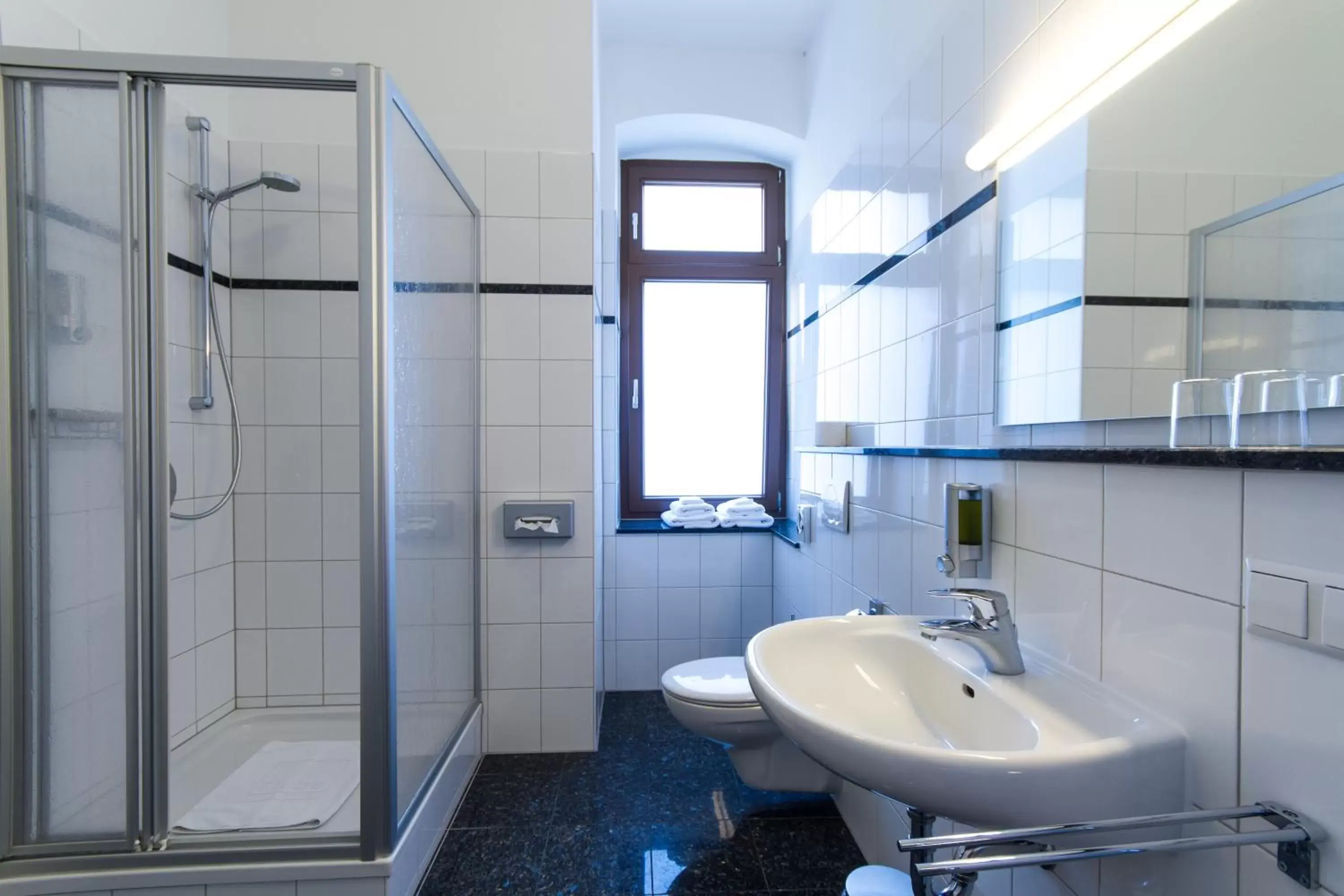 Bathroom in Qube Hotel Bergheim