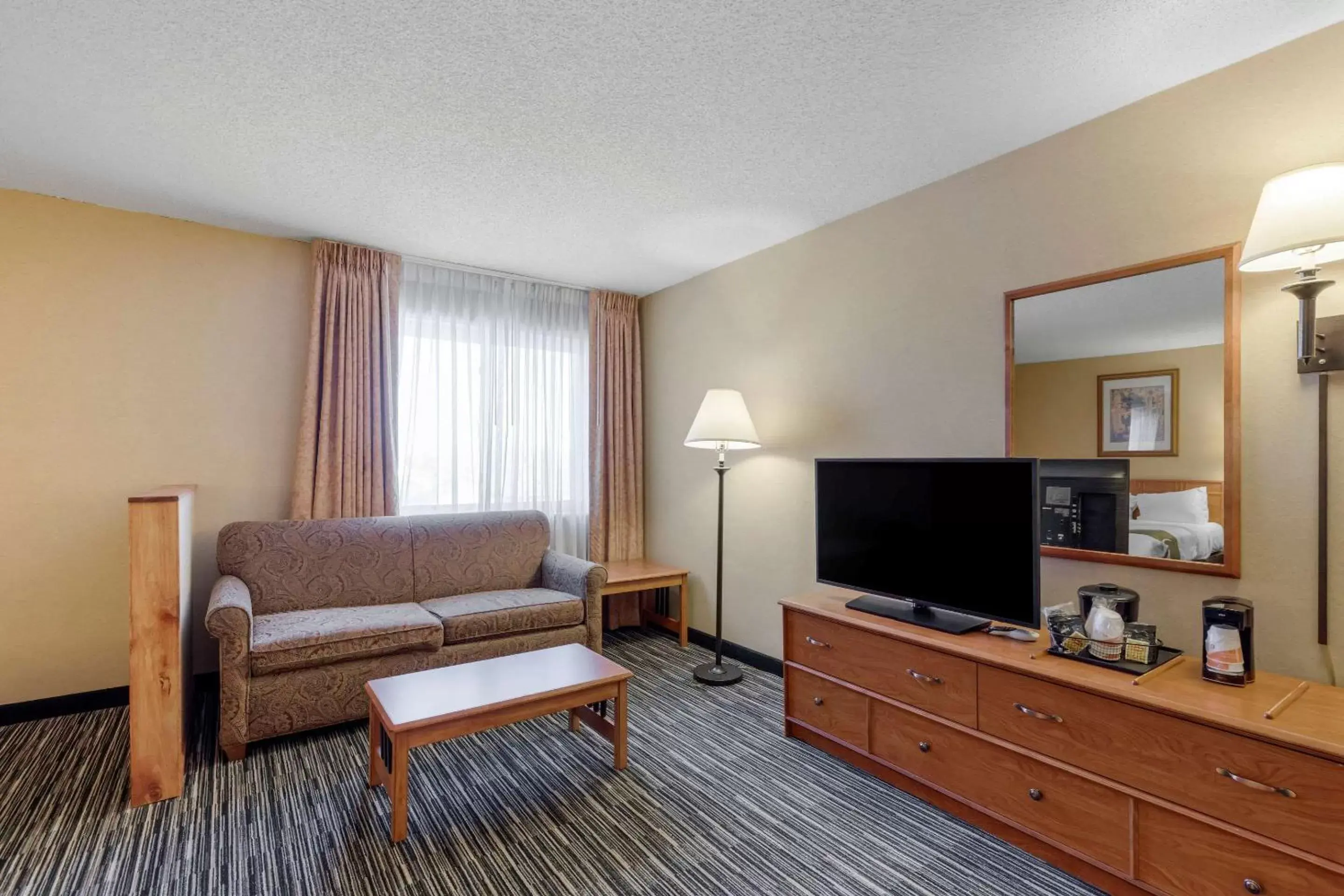 Bedroom, Seating Area in Quality Inn & Suites Wellington – Fort Collins