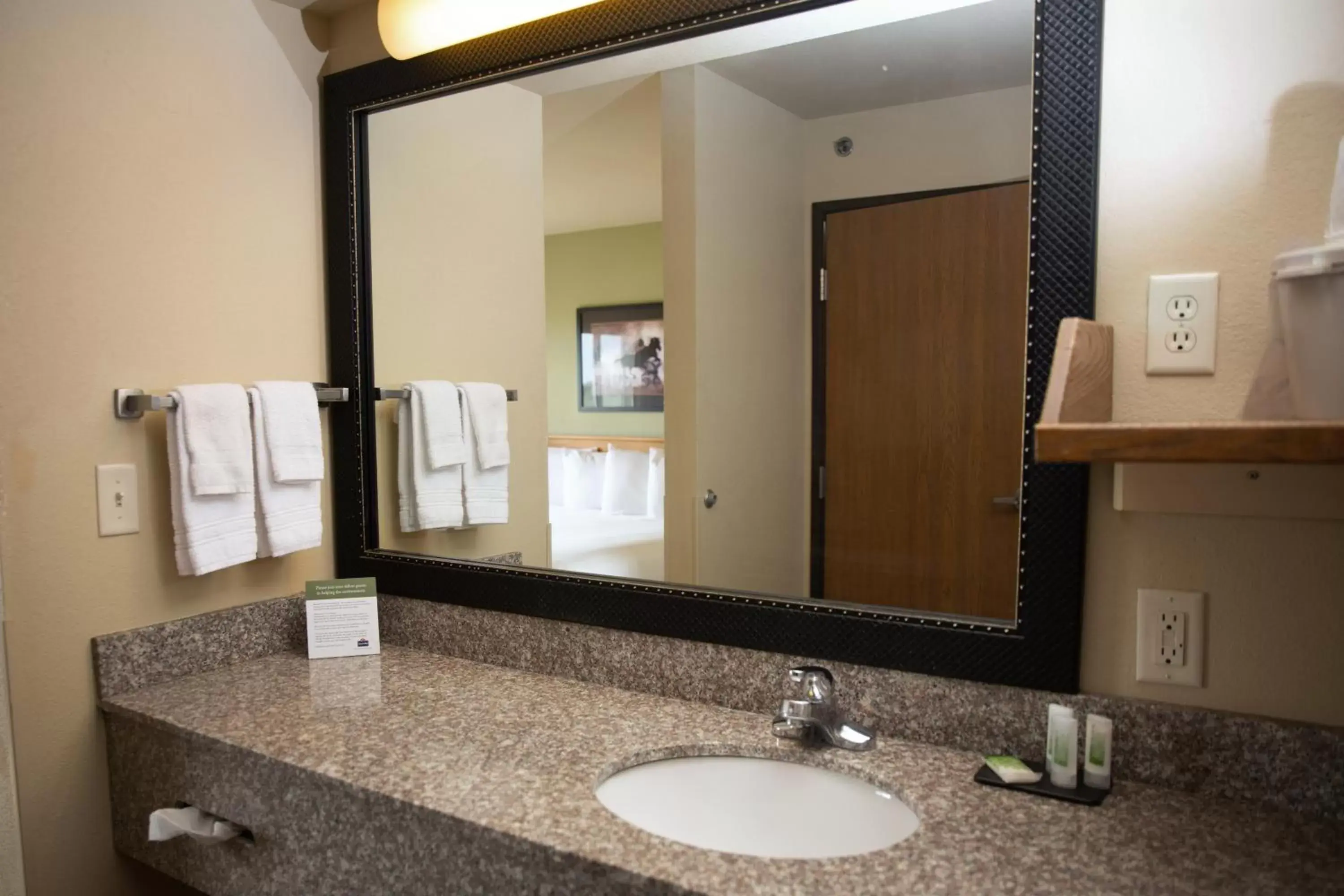 Bathroom in AmericInn by Wyndham Pampa Event Center