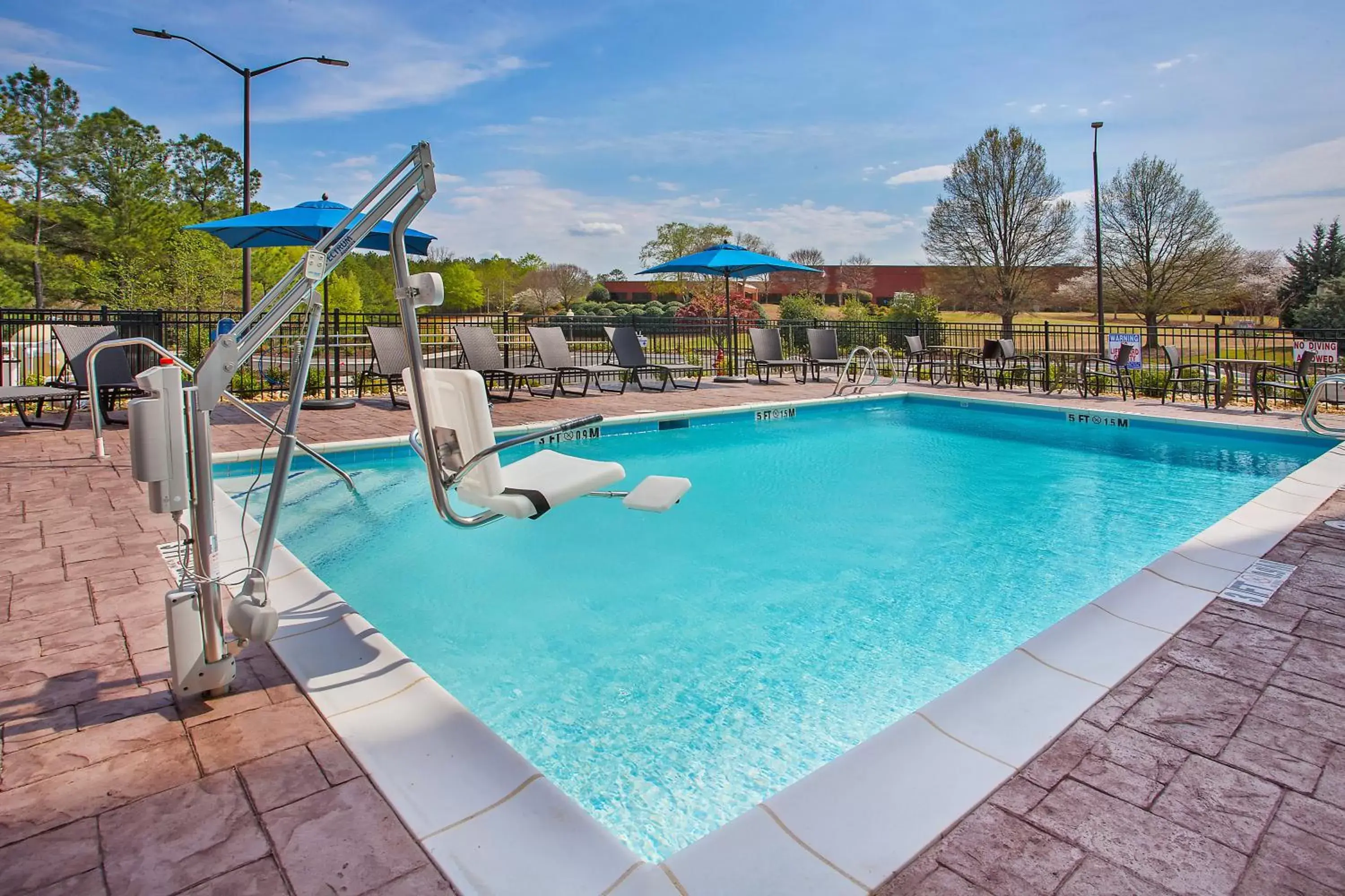 Swimming Pool in Holiday Inn Express & Suites Covington, an IHG Hotel