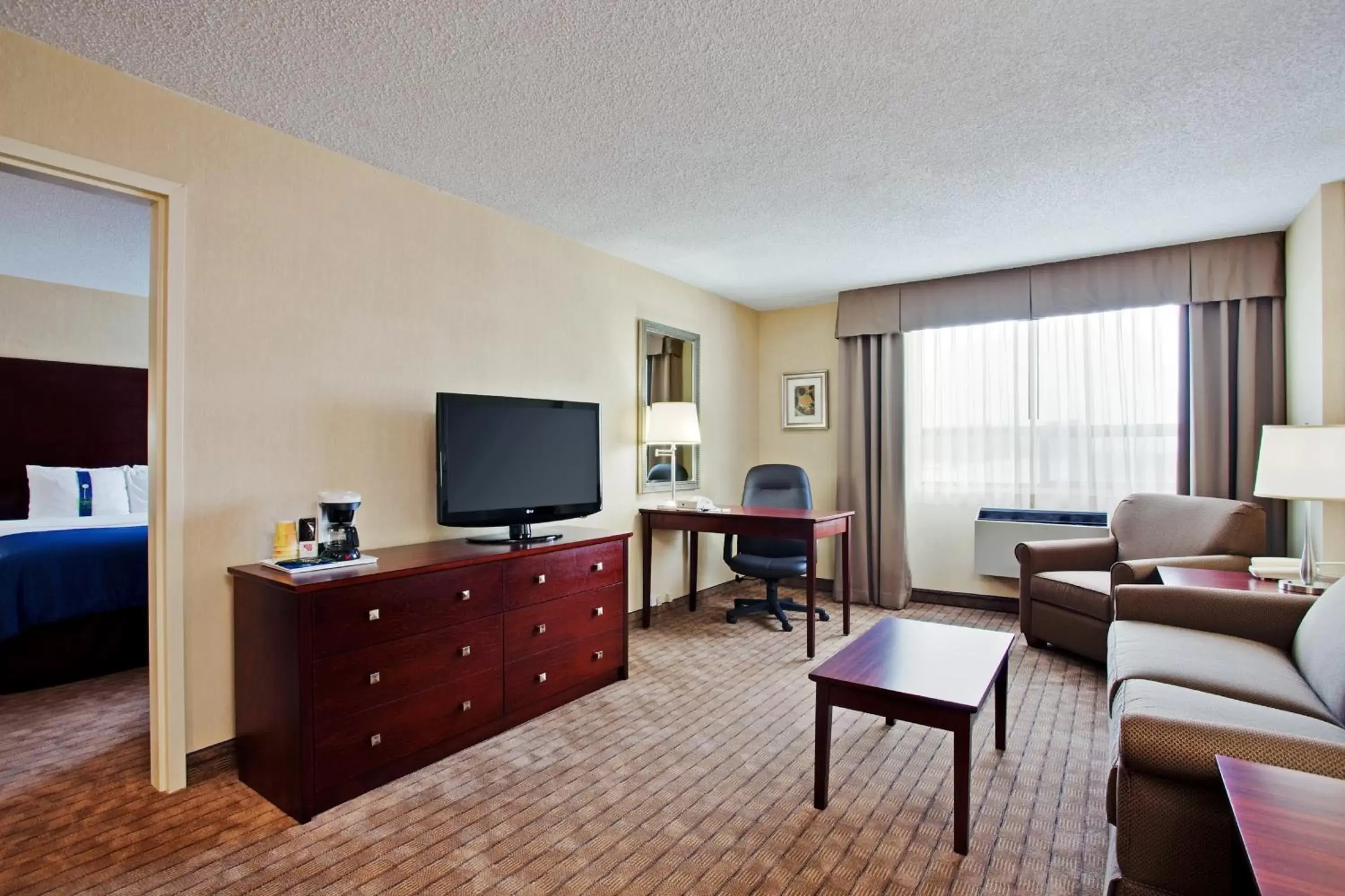 Photo of the whole room, TV/Entertainment Center in Holiday Inn & Suites Winnipeg Downtown, an IHG Hotel