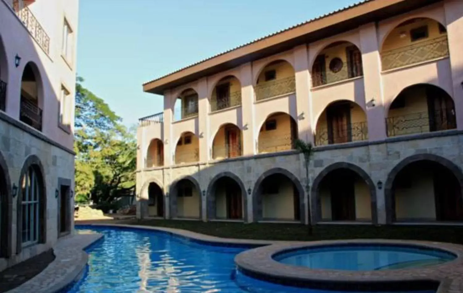 Swimming pool, Property Building in Corto del Mar Hotel