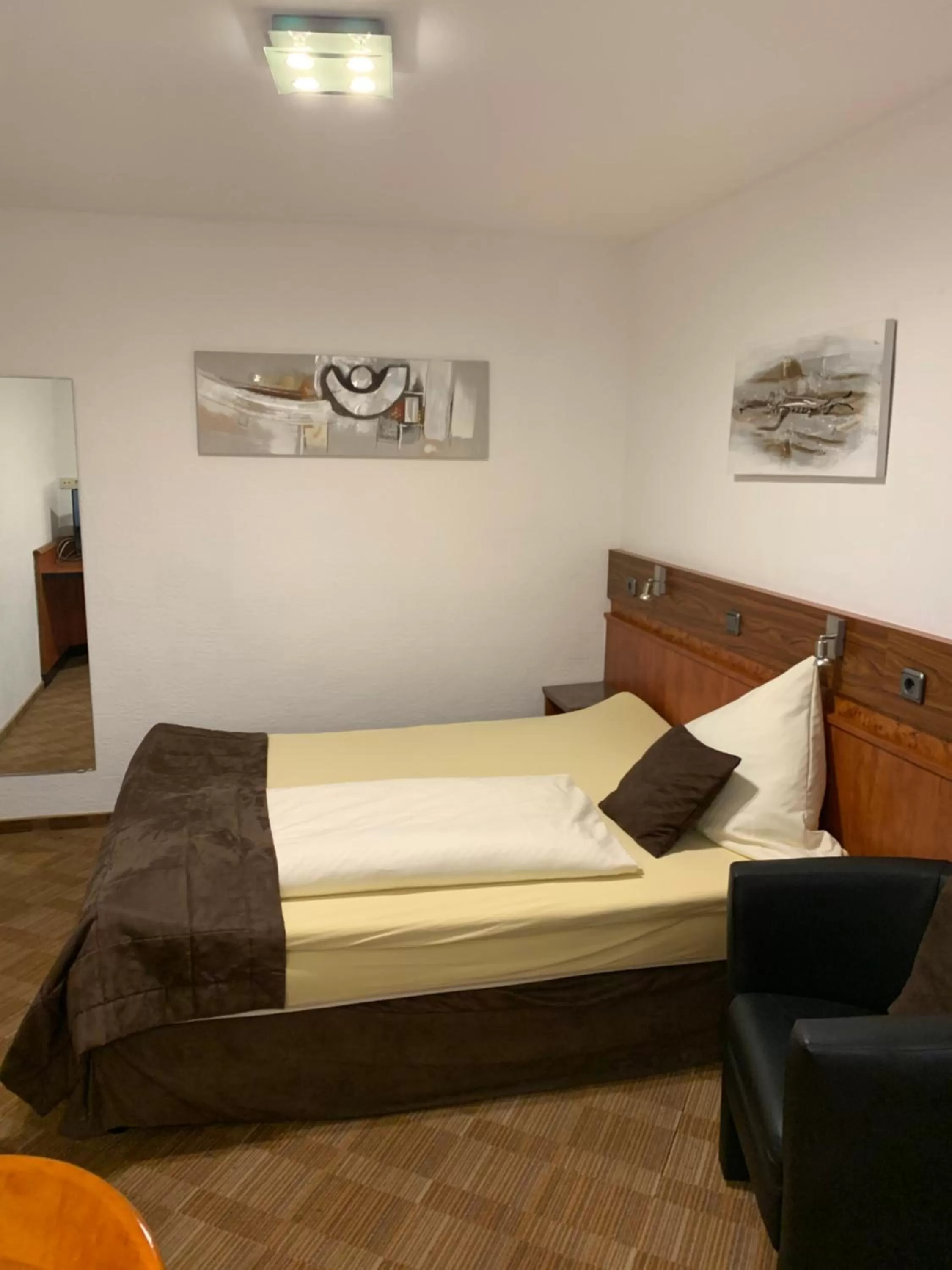 Bed in Gästehaus Präsenzhof