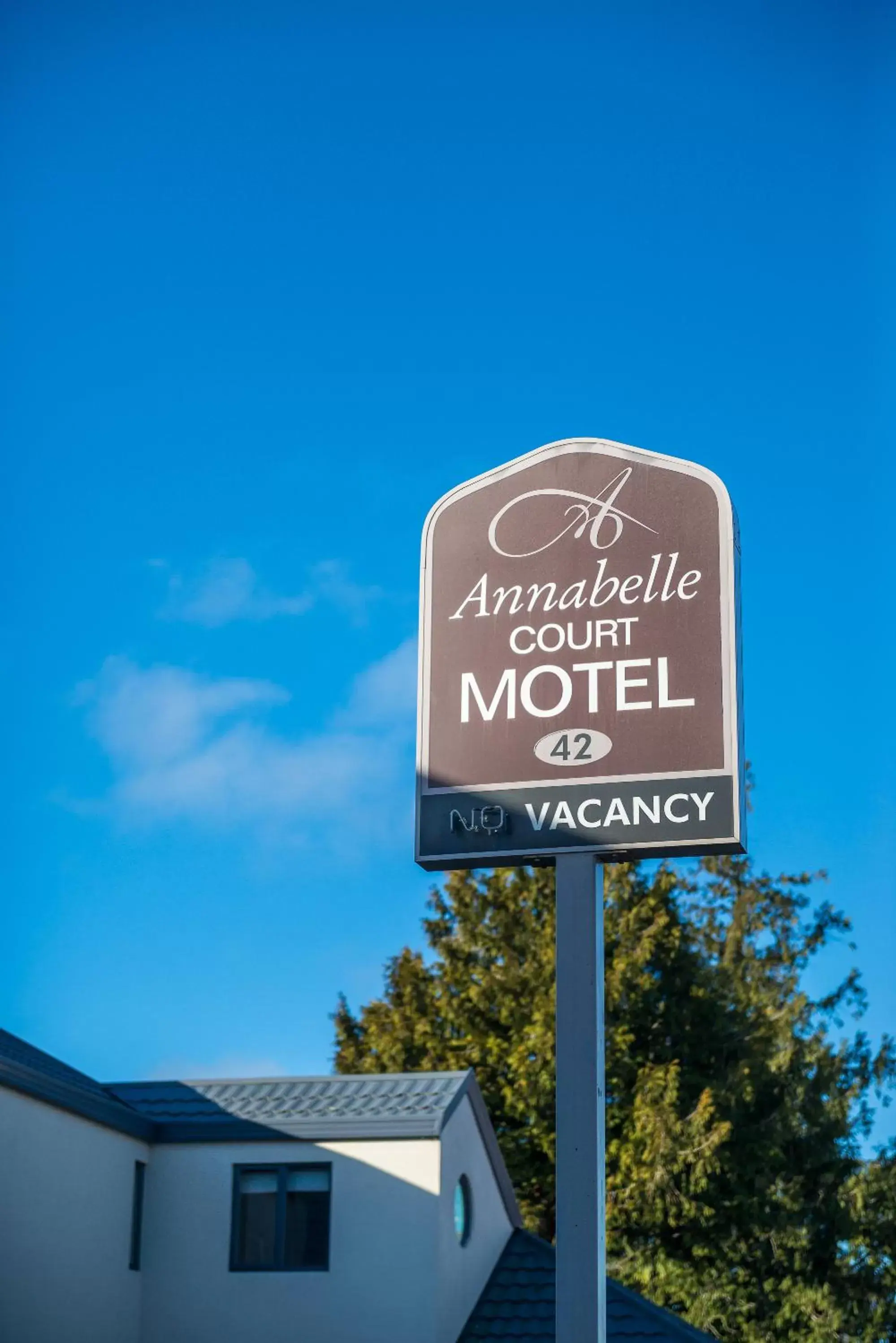 Property logo or sign in Annabelle Court Motel