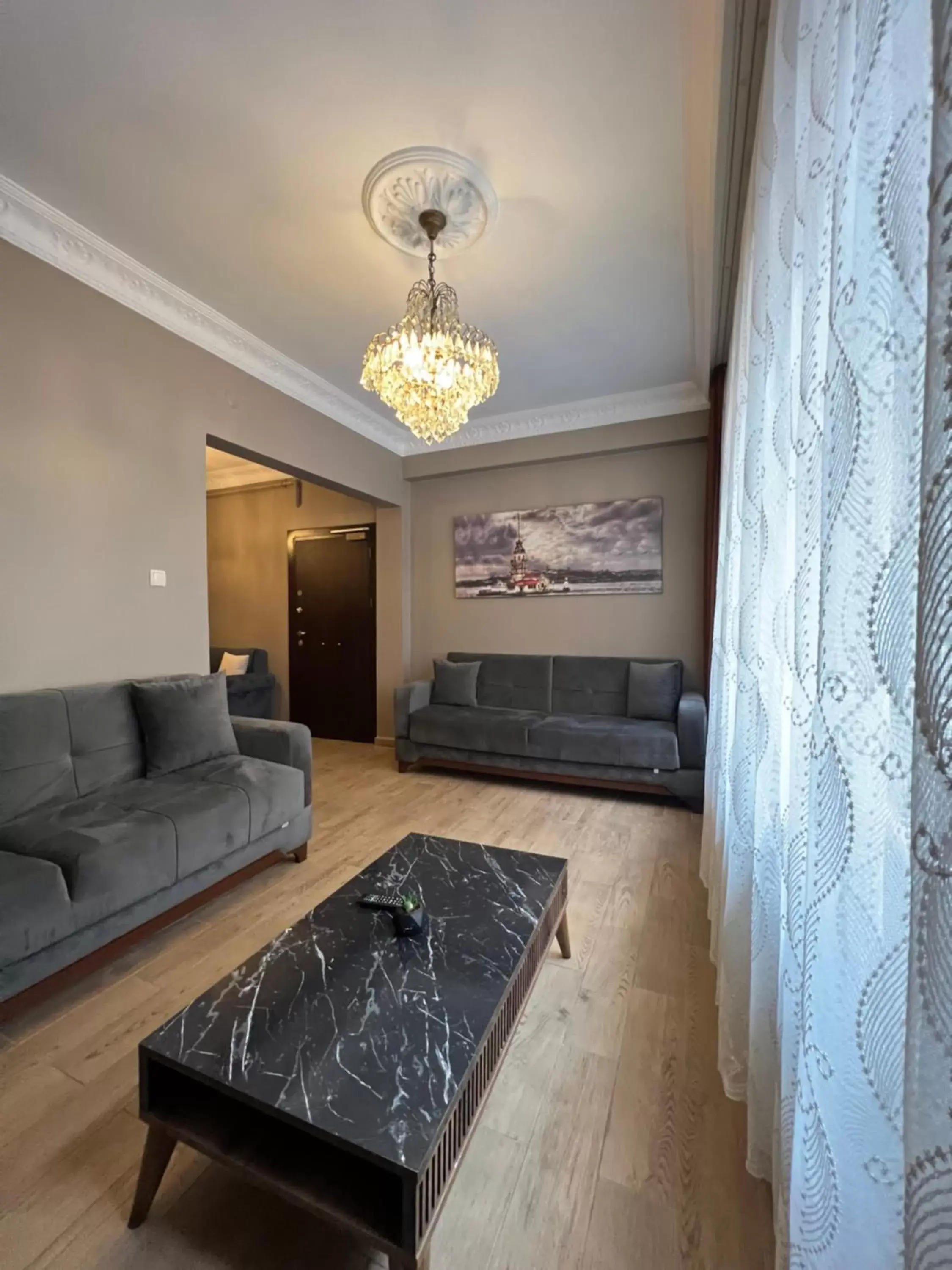 Living room, Seating Area in Zendy Suite Hotel