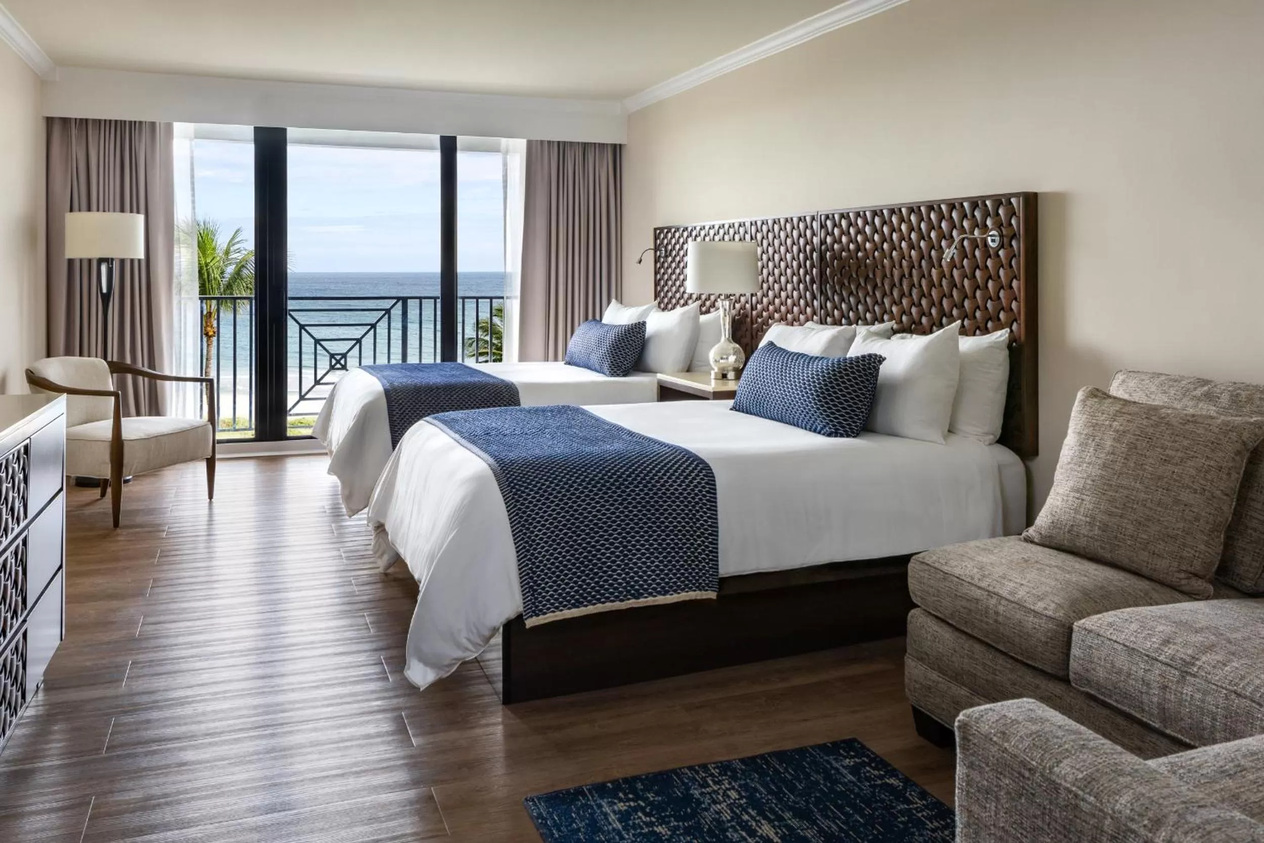 Sea view, Bed in Opal Grand Oceanfront Resort & Spa