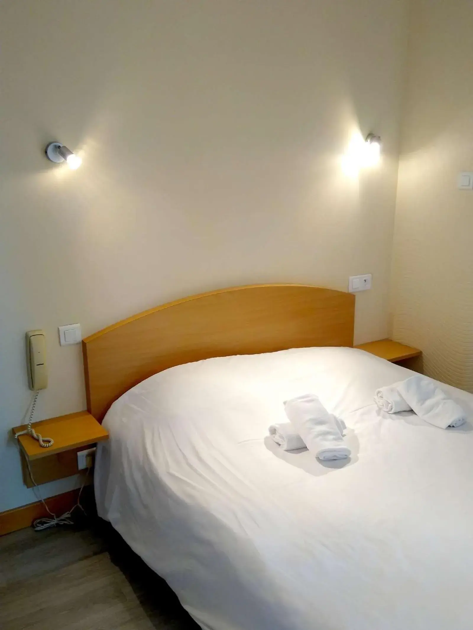 Bed in Hôtel des Sables Blancs