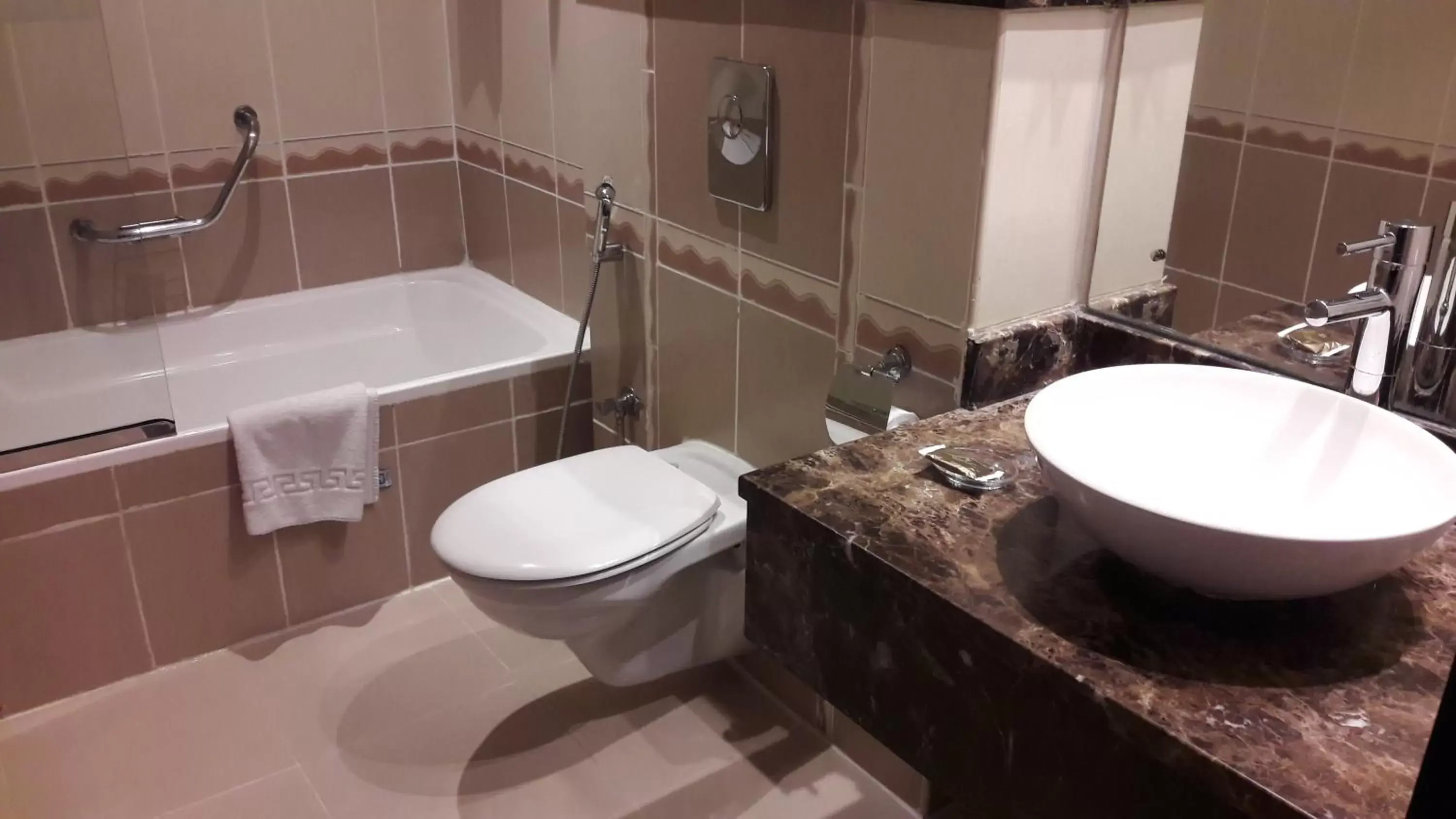 Bathroom in Landmark Riqqa Hotel