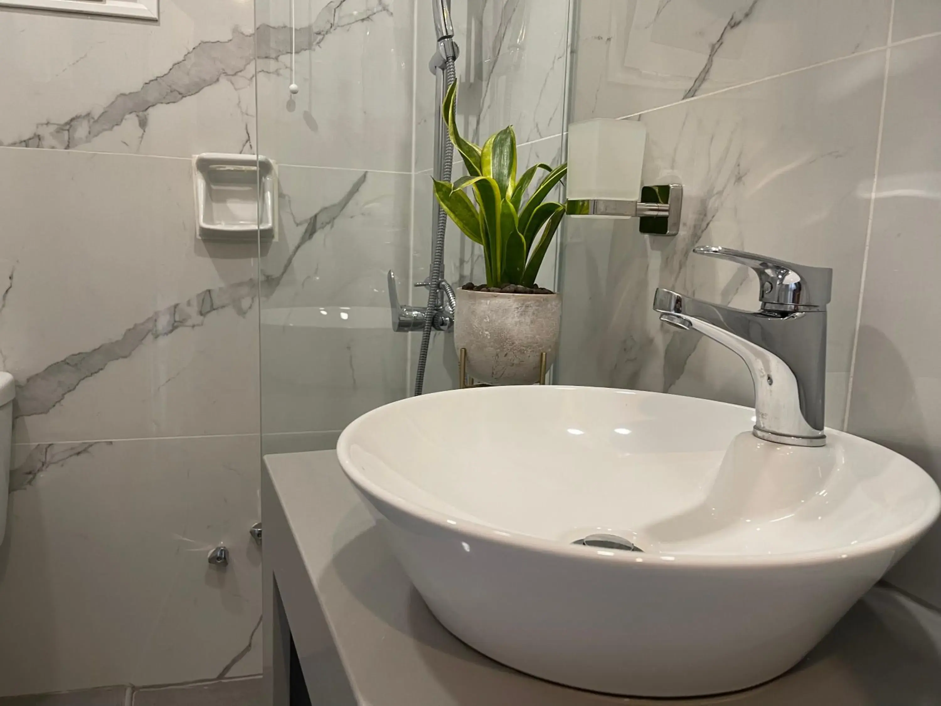 Bathroom in El Greco Hotel