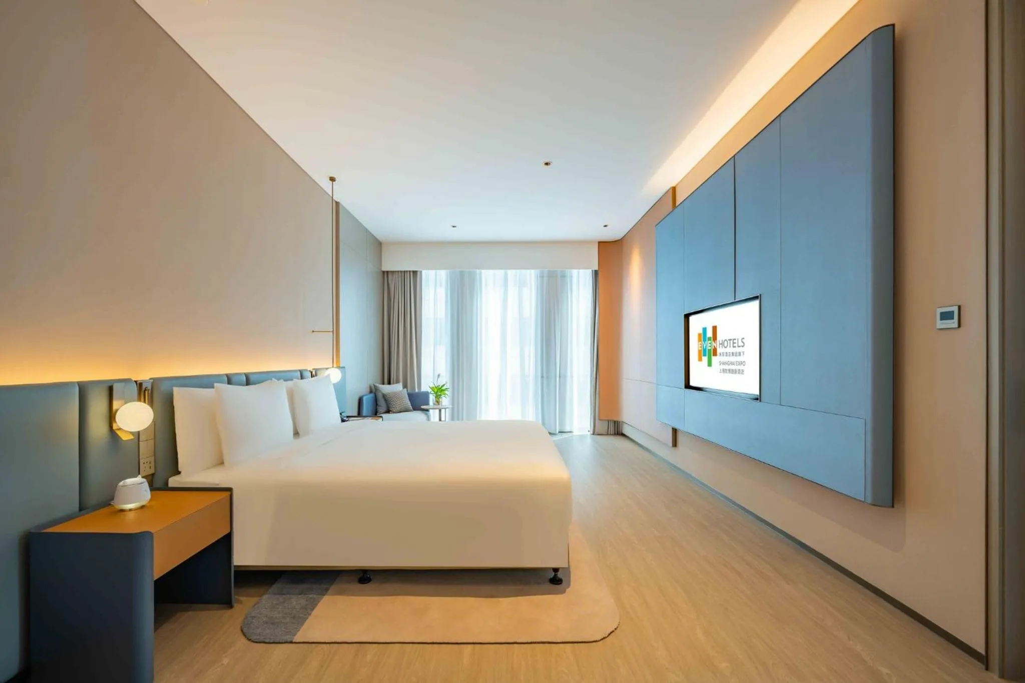 Photo of the whole room, Bed in EVEN Hotels Shanghai Expo by IHG