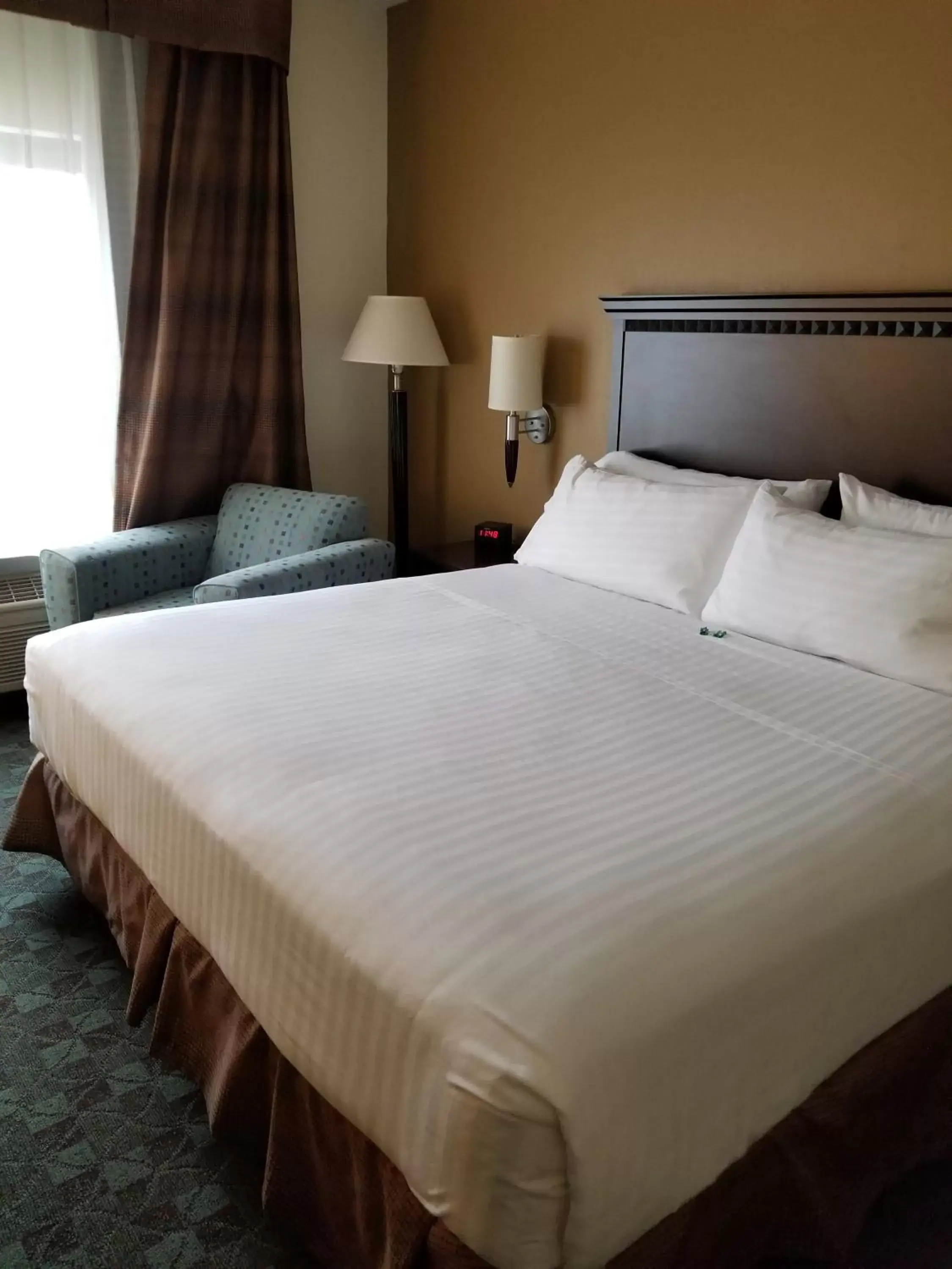 Bed in Holiday Inn Express Hotel & Suites Canton, an IHG Hotel
