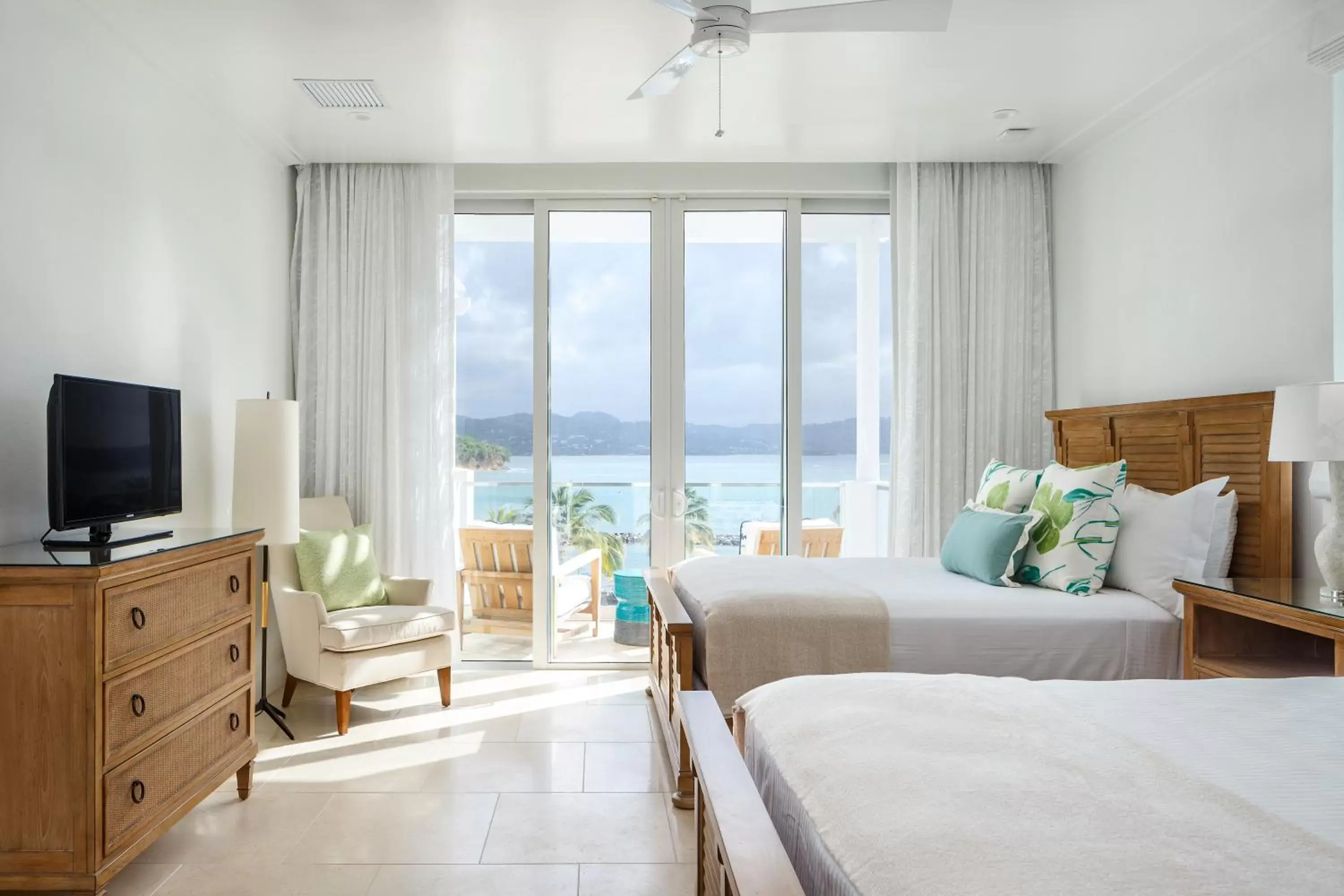 Photo of the whole room, Bed in Windjammer Landing Resort and Residences Photo of the whole room, Bed in Windjammer Landing Resort and Residences