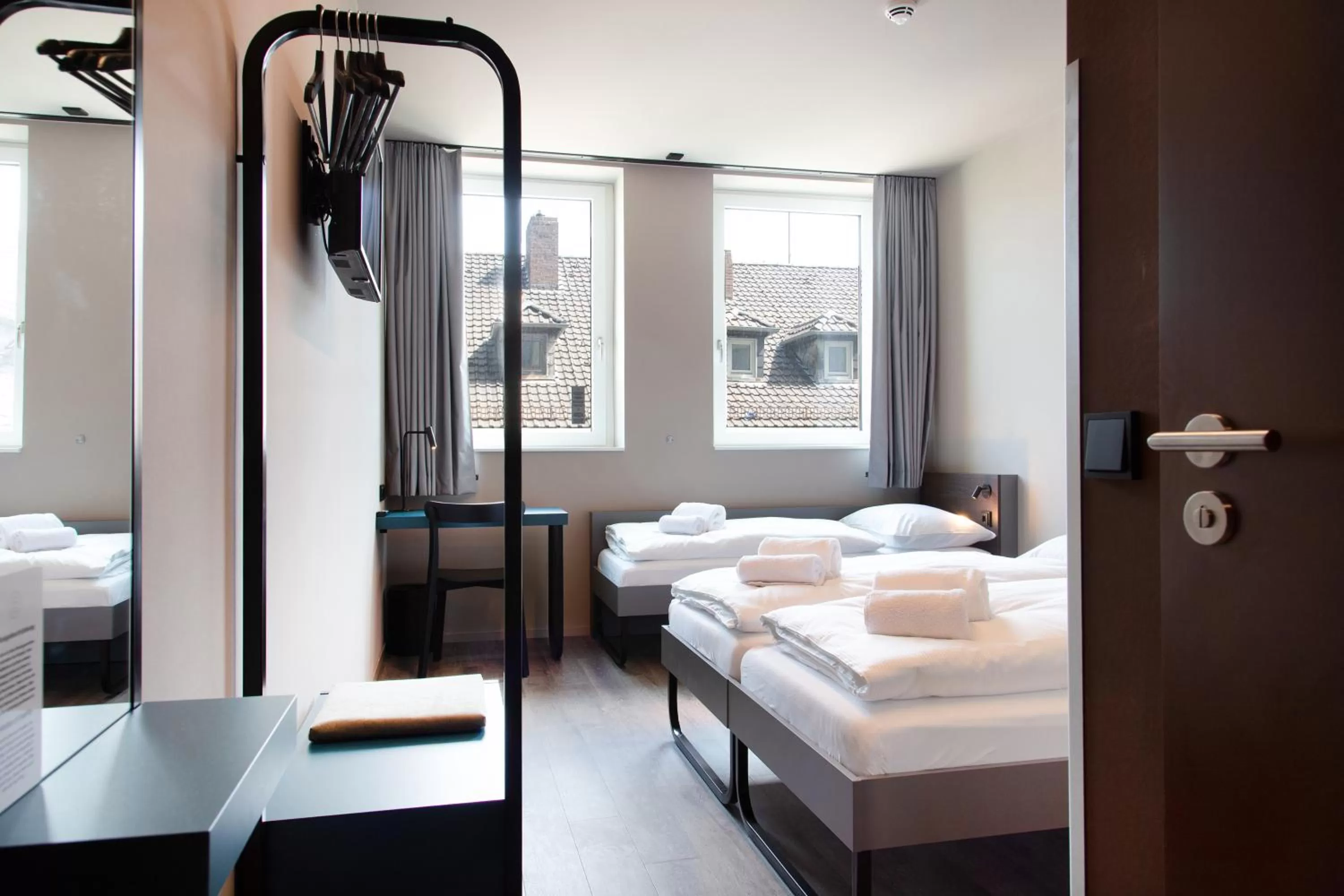 Photo of the whole room, Bed in MEININGER Hotel Bremen Hauptbahnhof