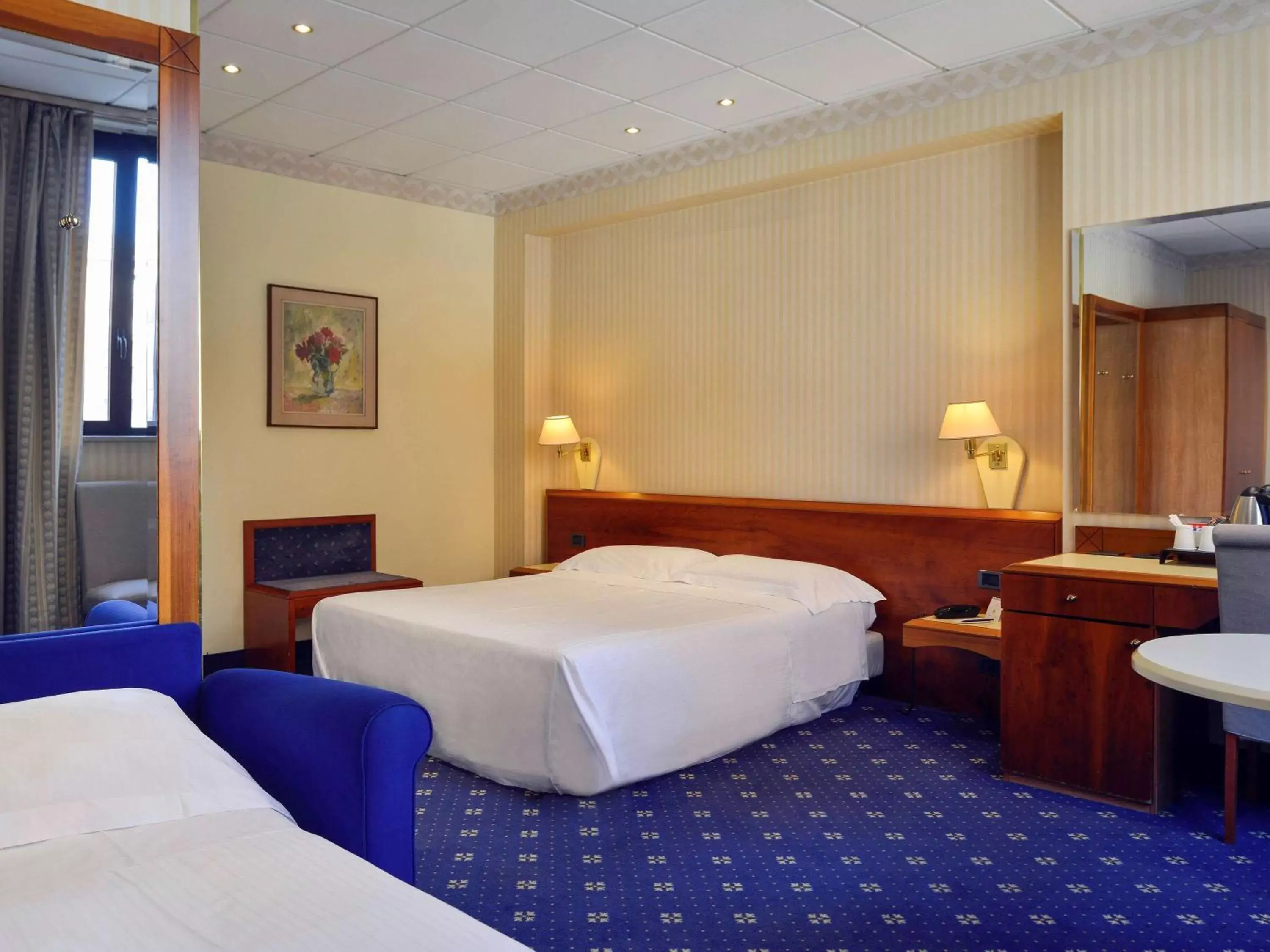 Photo of the whole room, Bed in Mercure Reggio Emilia Centro Astoria