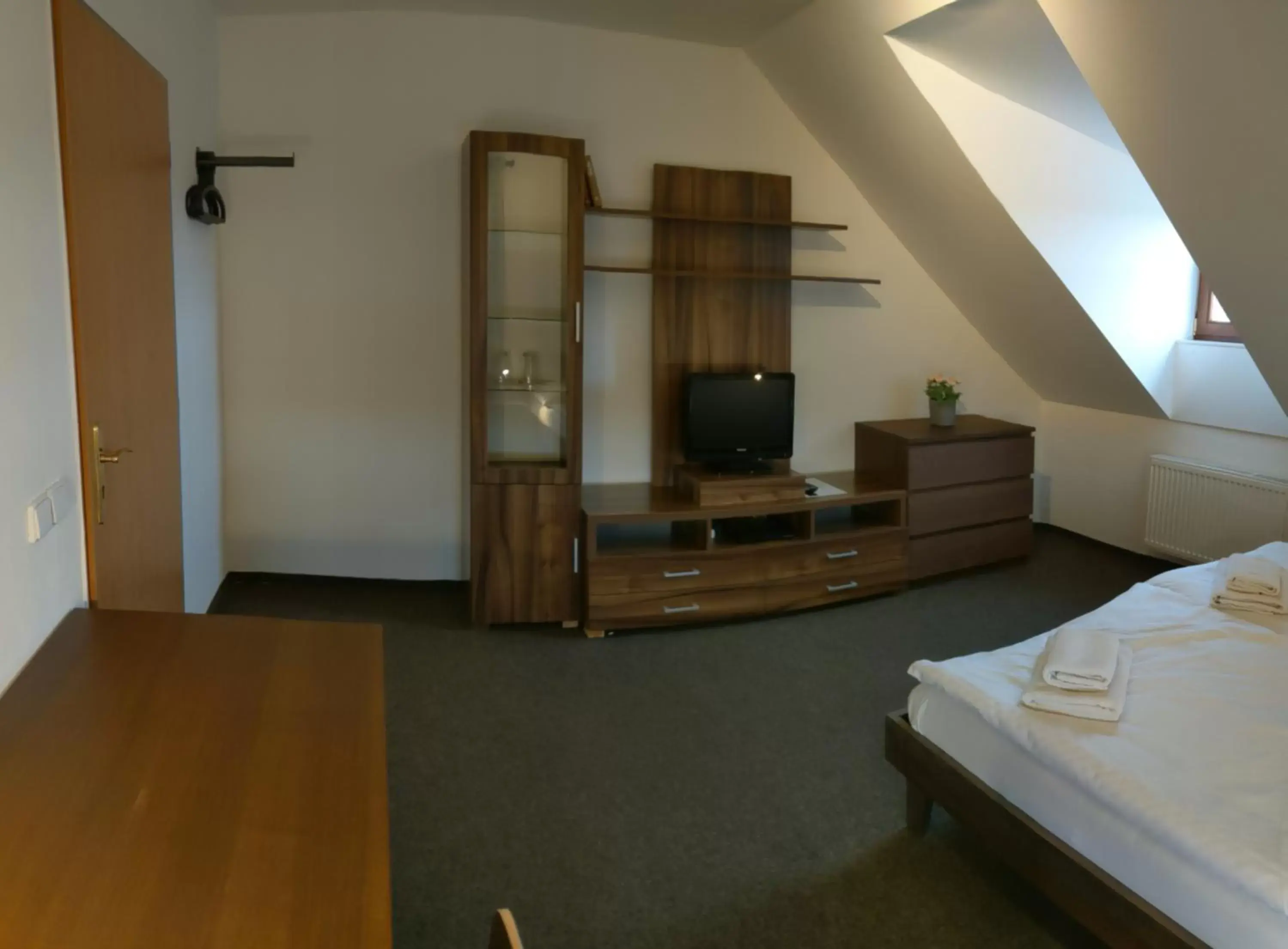 Bedroom, TV/Entertainment Center in Hotel Antoň