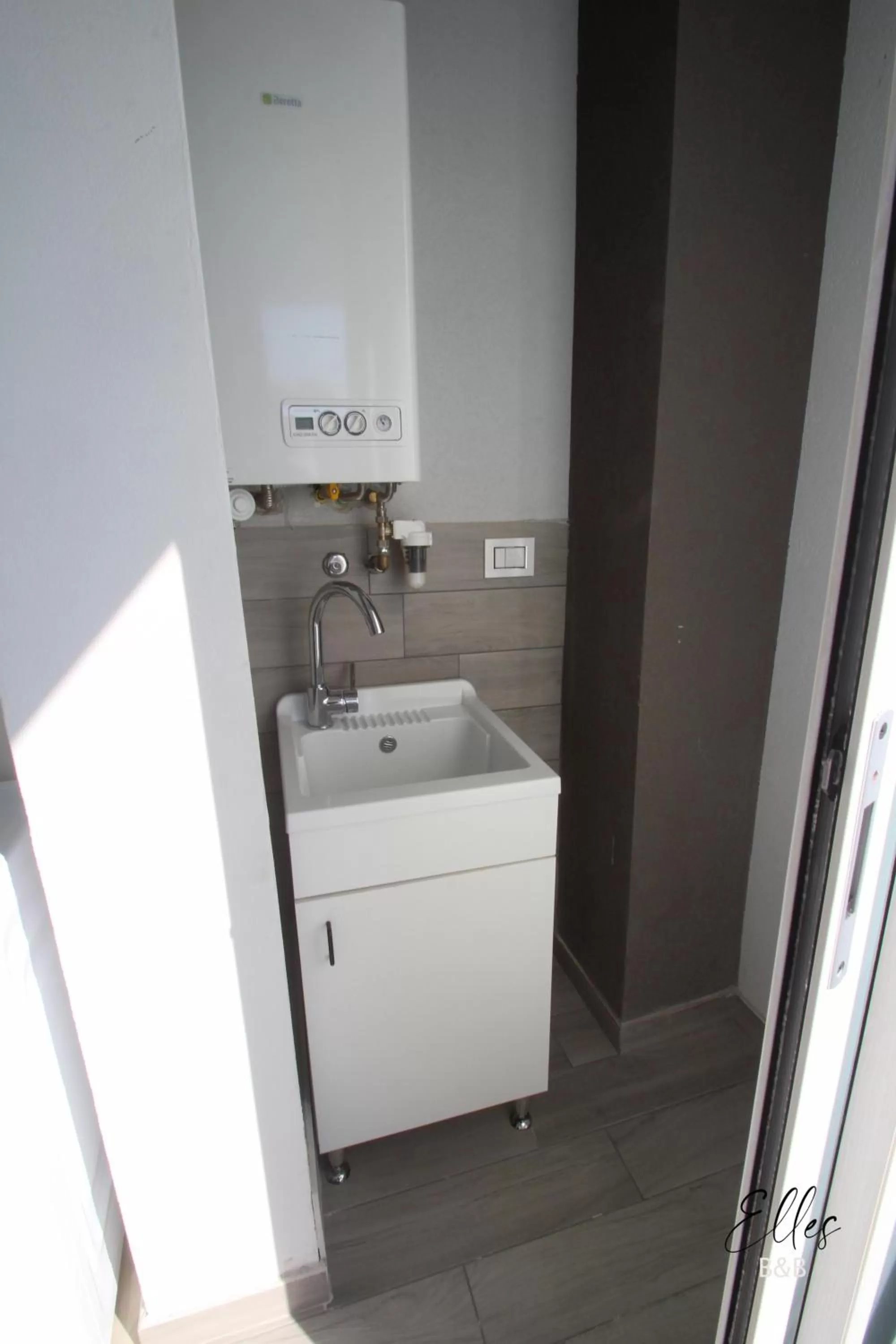 laundry in B&B Elles con parcheggio interno