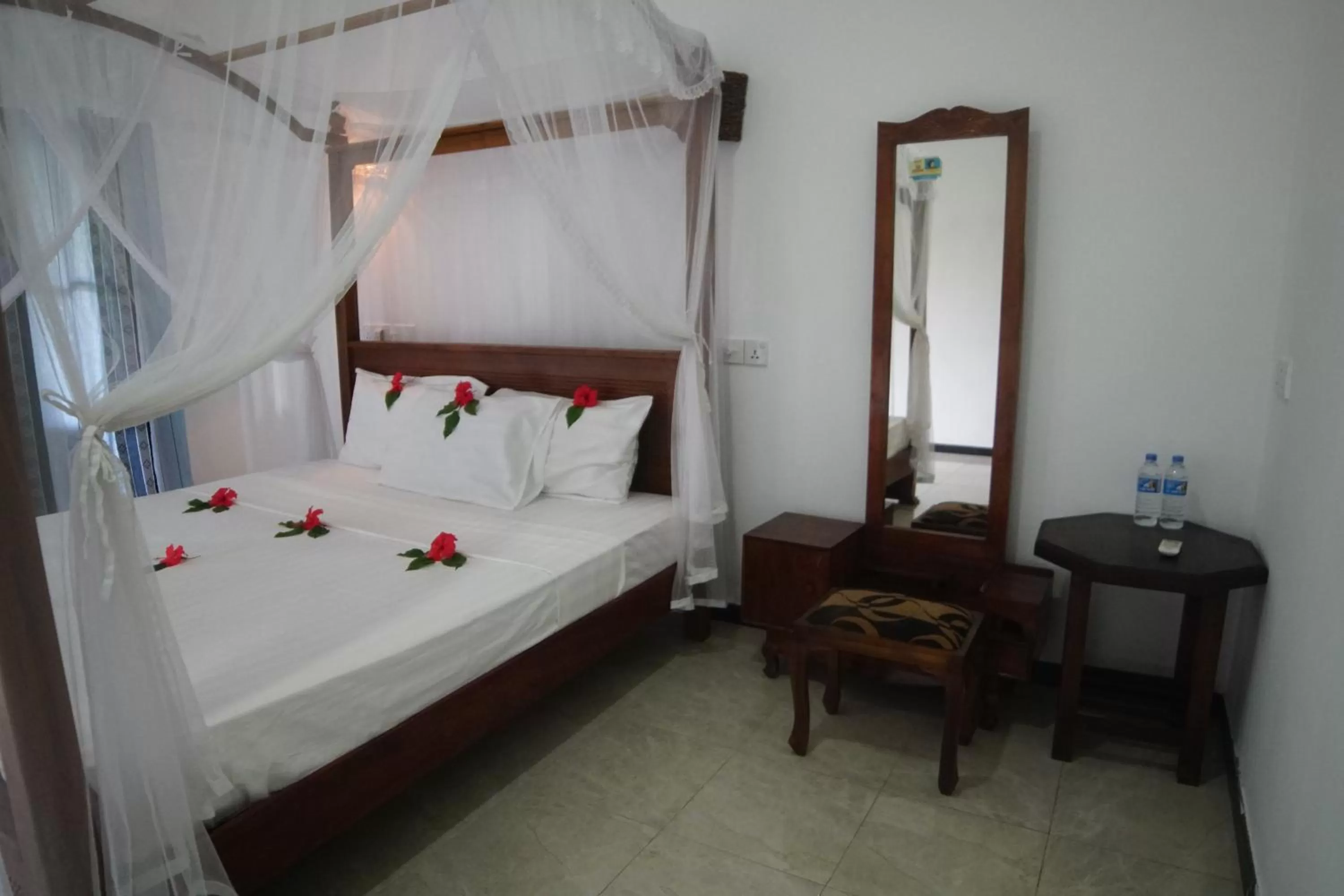 Bed in Turtle Bay Beach Resort