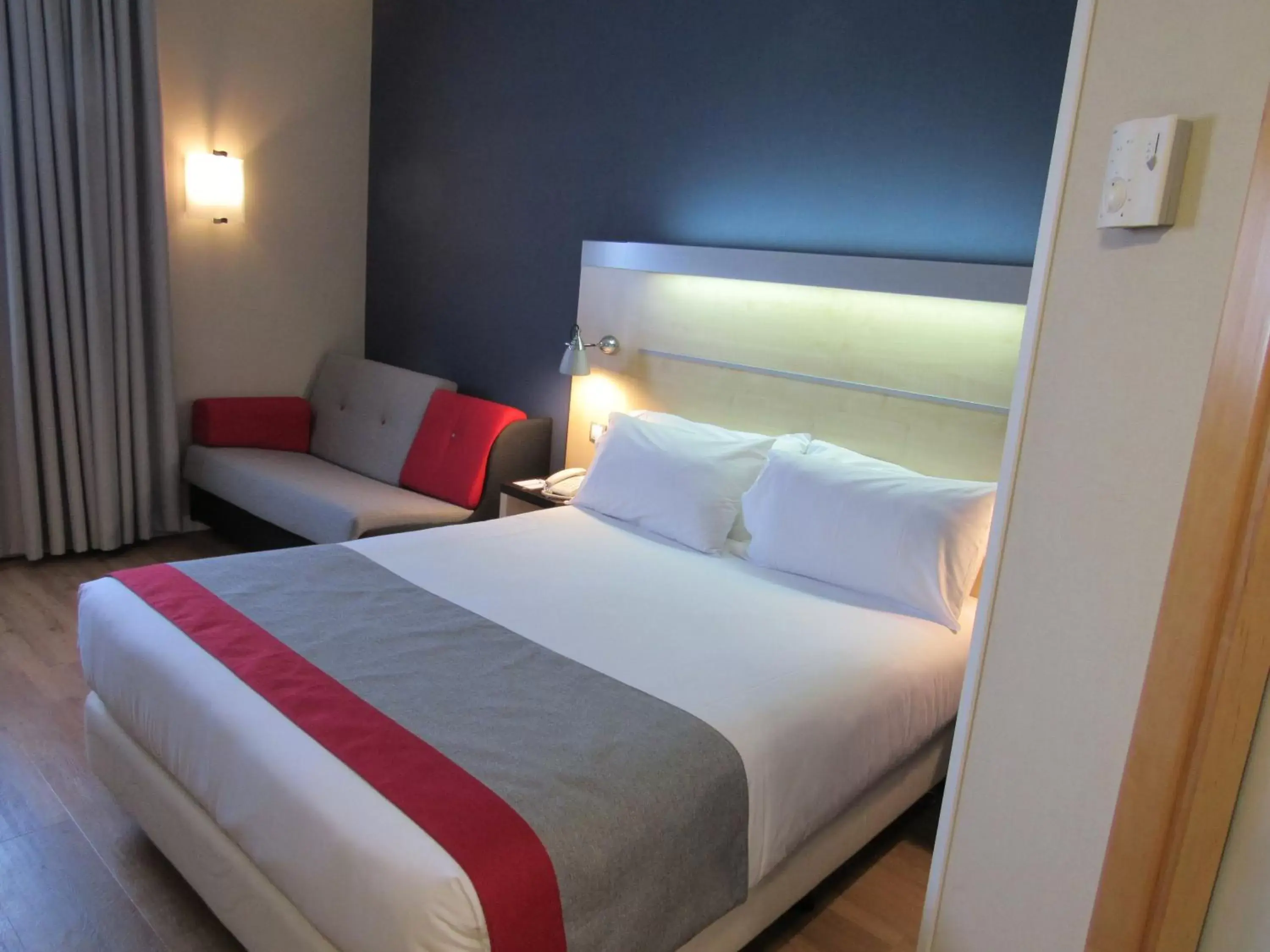 Bed in Holiday Inn Express Madrid-Alcorcón, an IHG Hotel