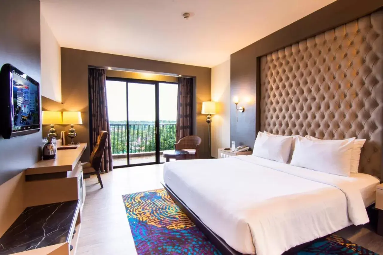 Bed in Grand Rocky Hotel Bukittinggi