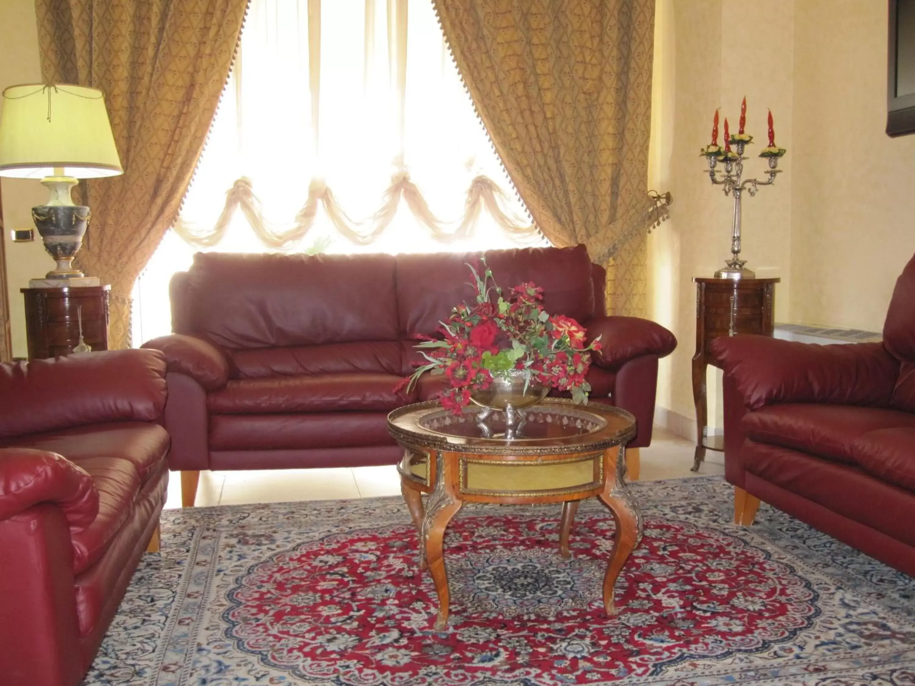 Communal lounge/ TV room, Seating Area in D'Angelo Palace Hotel