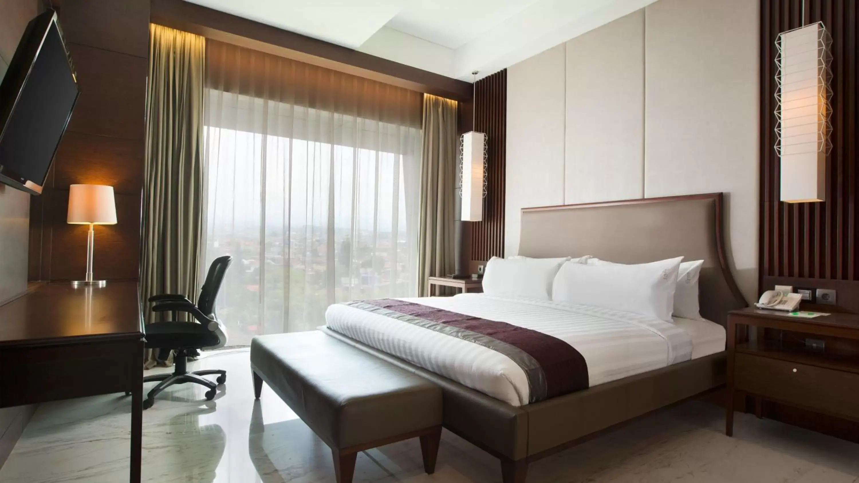Photo of the whole room, Bed in Holiday Inn Bandung Pasteur, an IHG Hotel