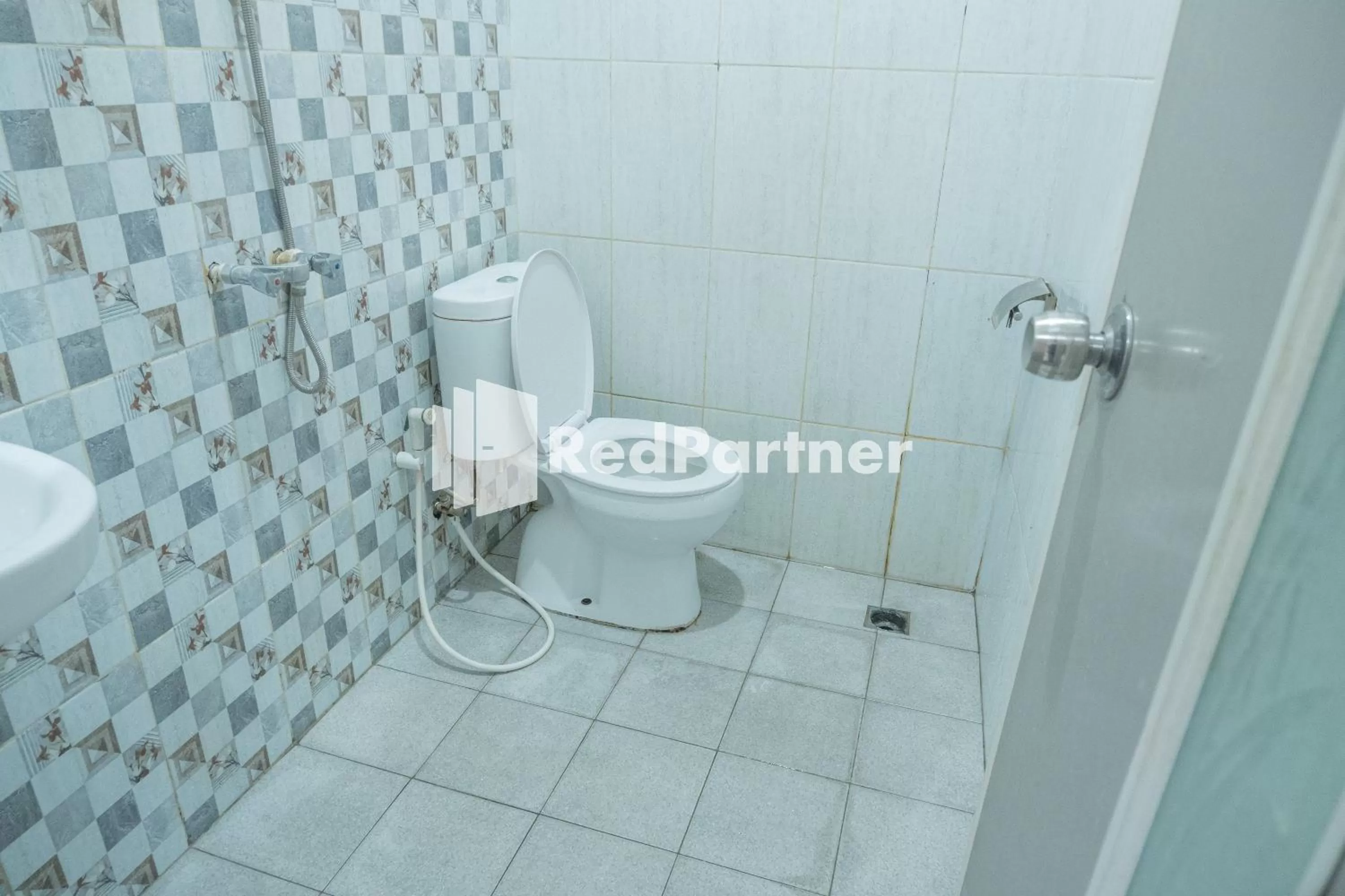 Bathroom in Crown Residence near Tugu Yogyakarta RedPartner