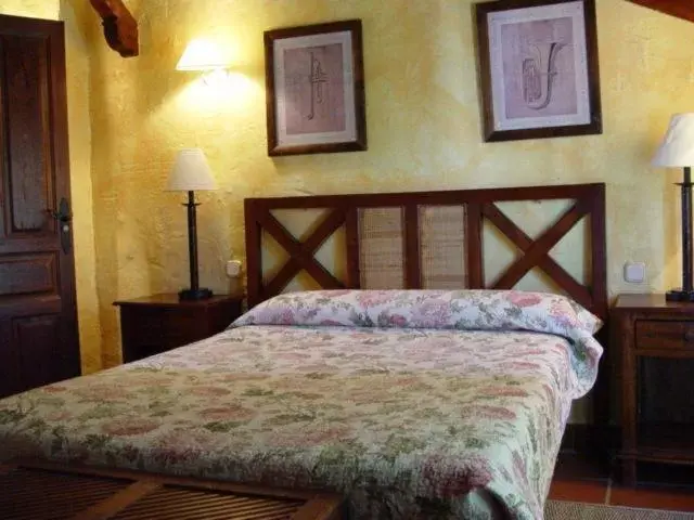 Bed in Hospedium Hacienda Las Cavas