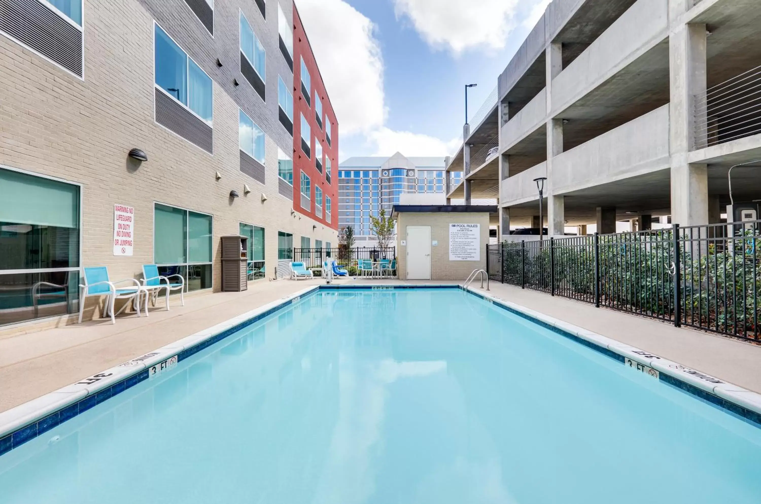 Swimming Pool in Holiday Inn Express & Suites - Farmers Branch, an IHG Hotel