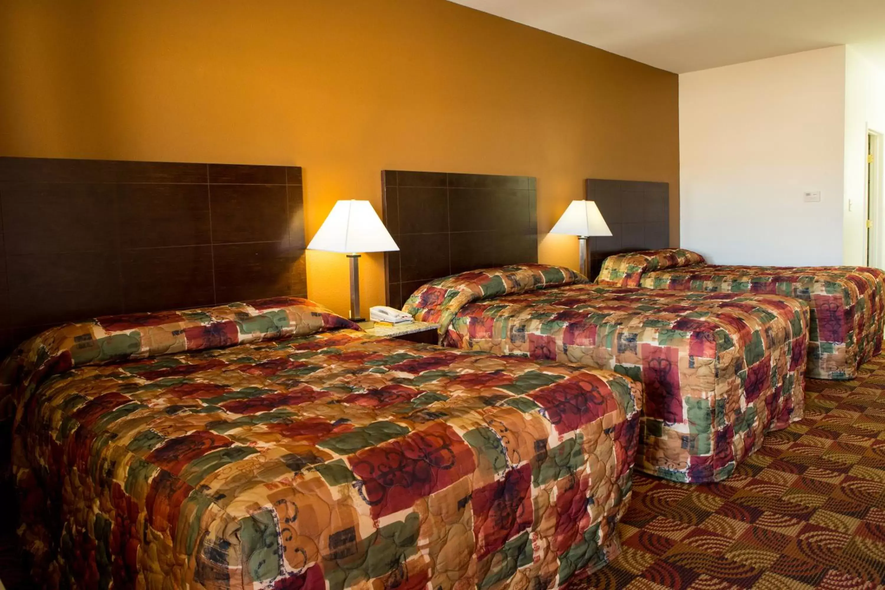 Bed in Sands Inn & Suites