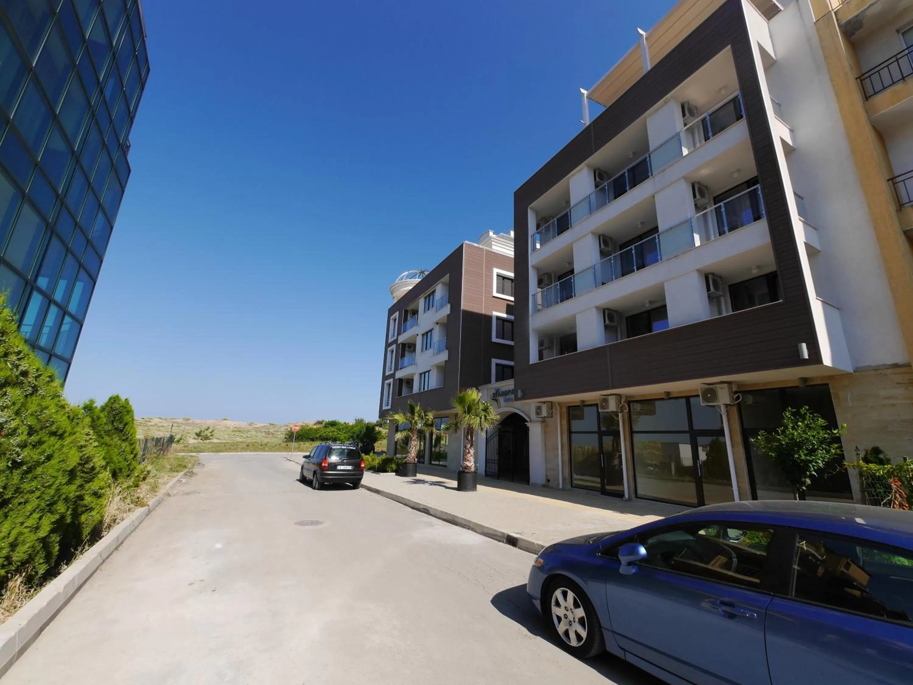 Property building in APART-HOTEL Stamopolu Lux с изглед към морето