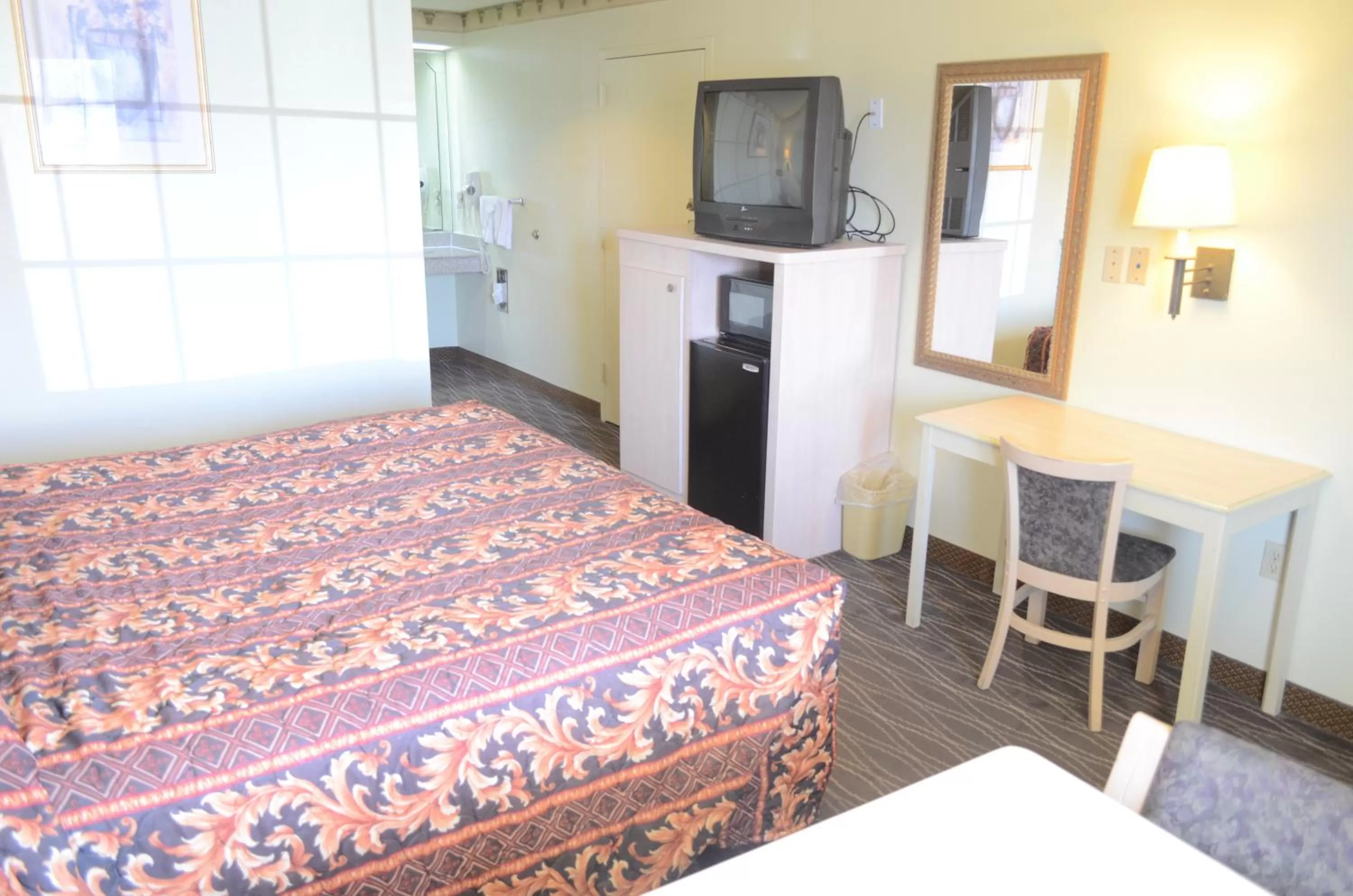 Bedroom, Bed in Scottish Inn and Suites NRG Park/Texas Medical Center - Houston