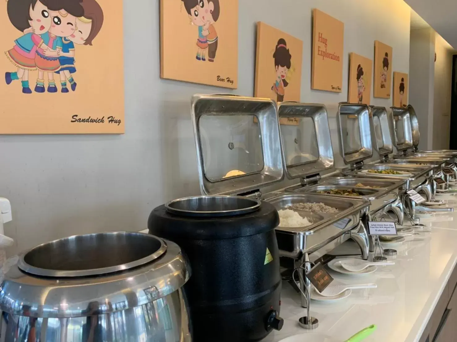 Buffet breakfast in De Hug Hotel & Residence Buffet breakfast in De Hug Hotel & Residence