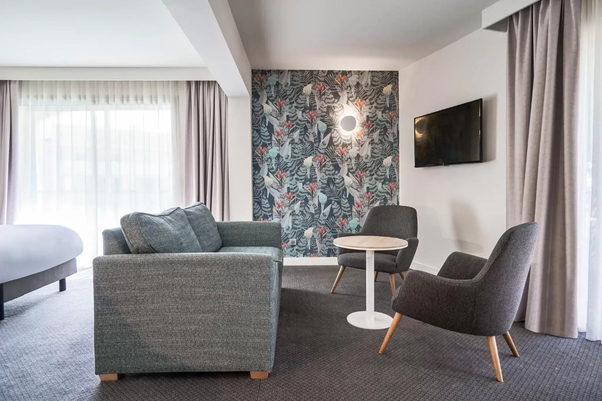 Bedroom, Seating Area in Holiday Inn Perpignan, an IHG Hotel