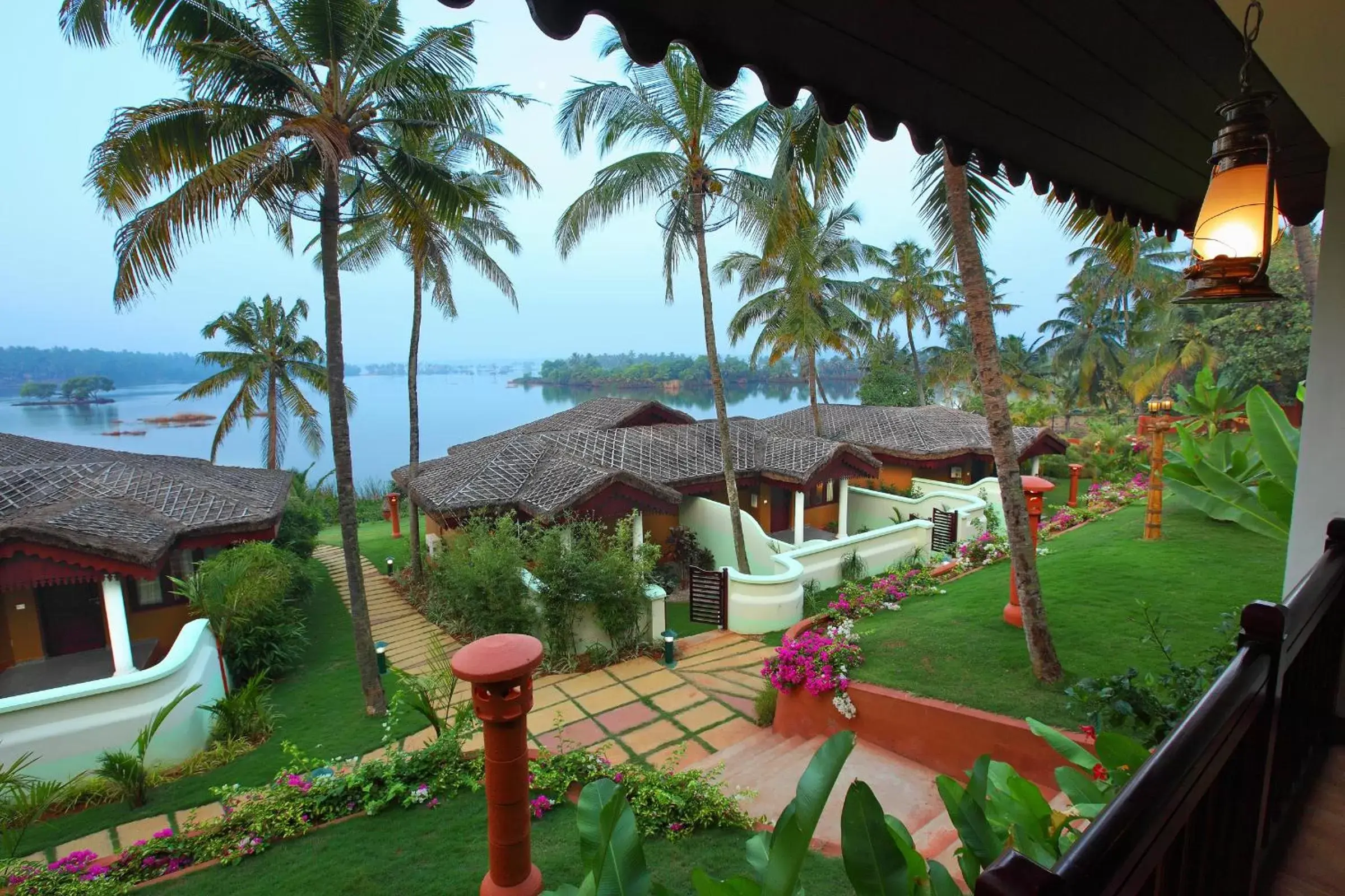 Premium lake view villa with Private Terrace in Fragrant Nature Backwater Resort & Ayurveda Spa Kollam